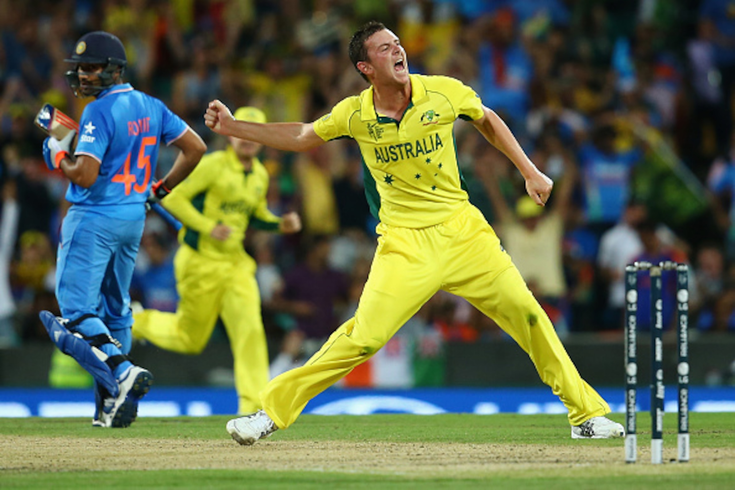 SYDNEY, AUSTRALIA - MARCH 26:  Josh Hazlewood of Australia celebrates after taking the wicket of Shikhar Dhawan of India during the 2015 Cricket World Cup Semi Final match between Australia and India at Sydney Cricket Ground on March 26, 2015 in Sydney, A
