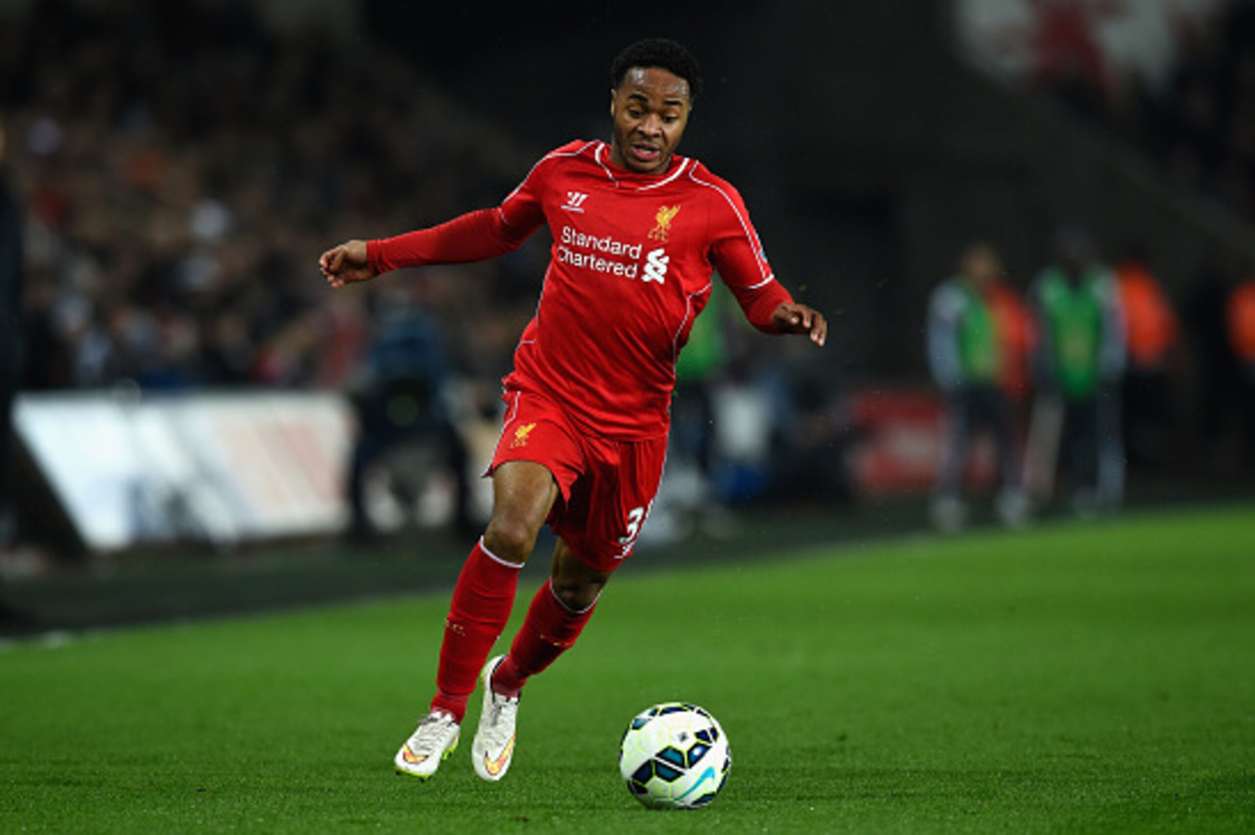 SWANSEA, WALES - MARCH 16:  Liverpool player Raheem Sterling in action during the Barclays Premiership match between Swansea City and Liverpool at Liberty Stadium on March 16, 2015 in Swansea, Wales.  (Photo by Stu Forster/Getty Images)