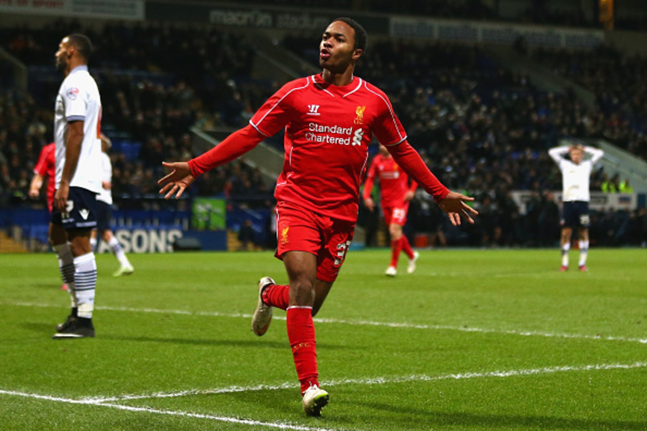BOLTON, ENGLAND - FEBRUARY 04:  Raheem Sterling of Liverpool celebrates scoring their first goal  during the FA Cup Fourth round replay between Bolton Wanderers and Liverpool at Macron Stadium on February 4, 2015 in Bolton, England.  (Photo by Michael Ste