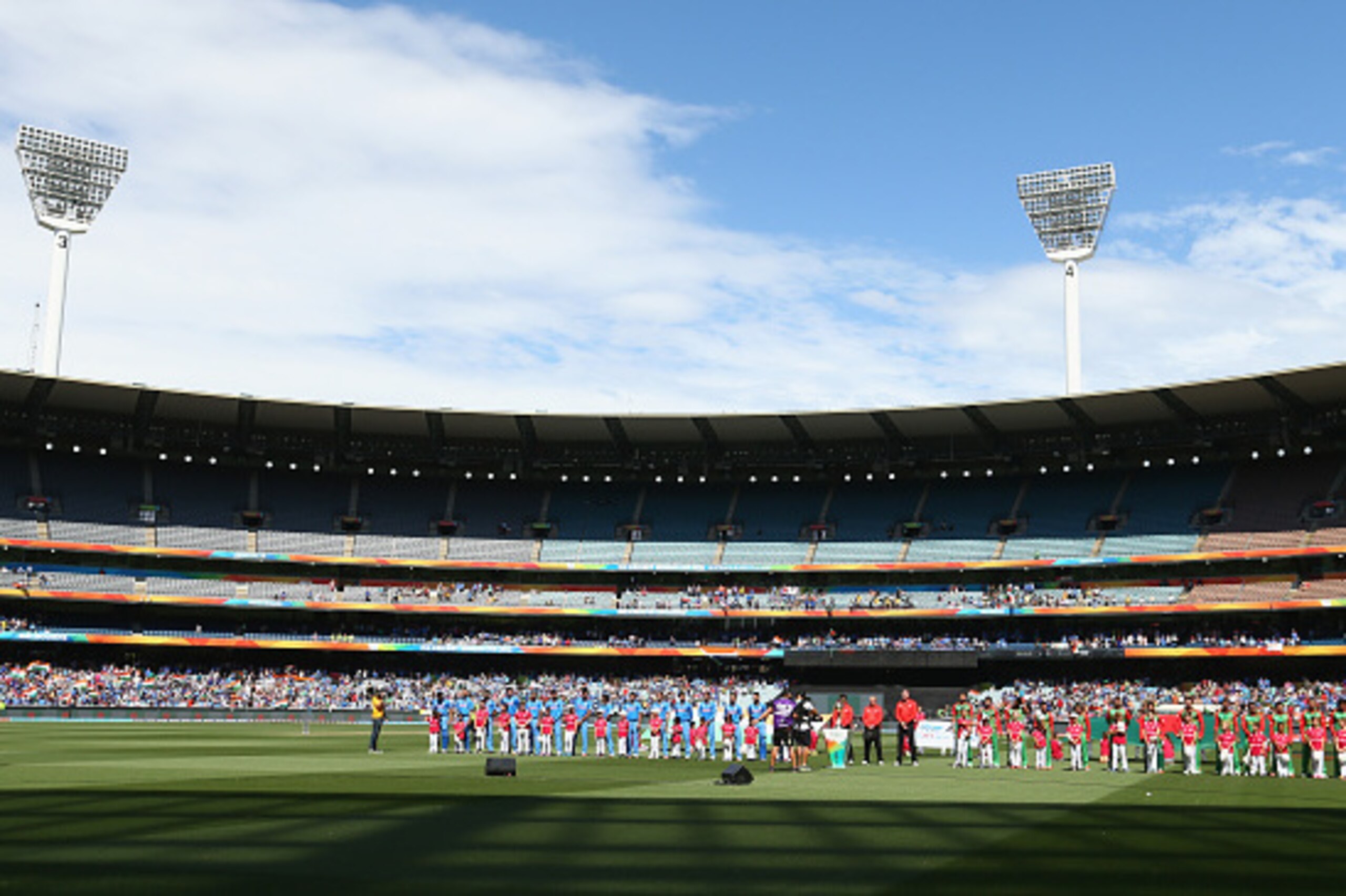 MELBOURNE, AUSTRALIA - MARCH 19:  The teams line up for the 2015 ICC Cricket World Cup match between India and Bangldesh at Melbourne Cricket Ground on March 19, 2015 in Melbourne, Australia.  (Photo by Robert Cianflone/Getty Images)
