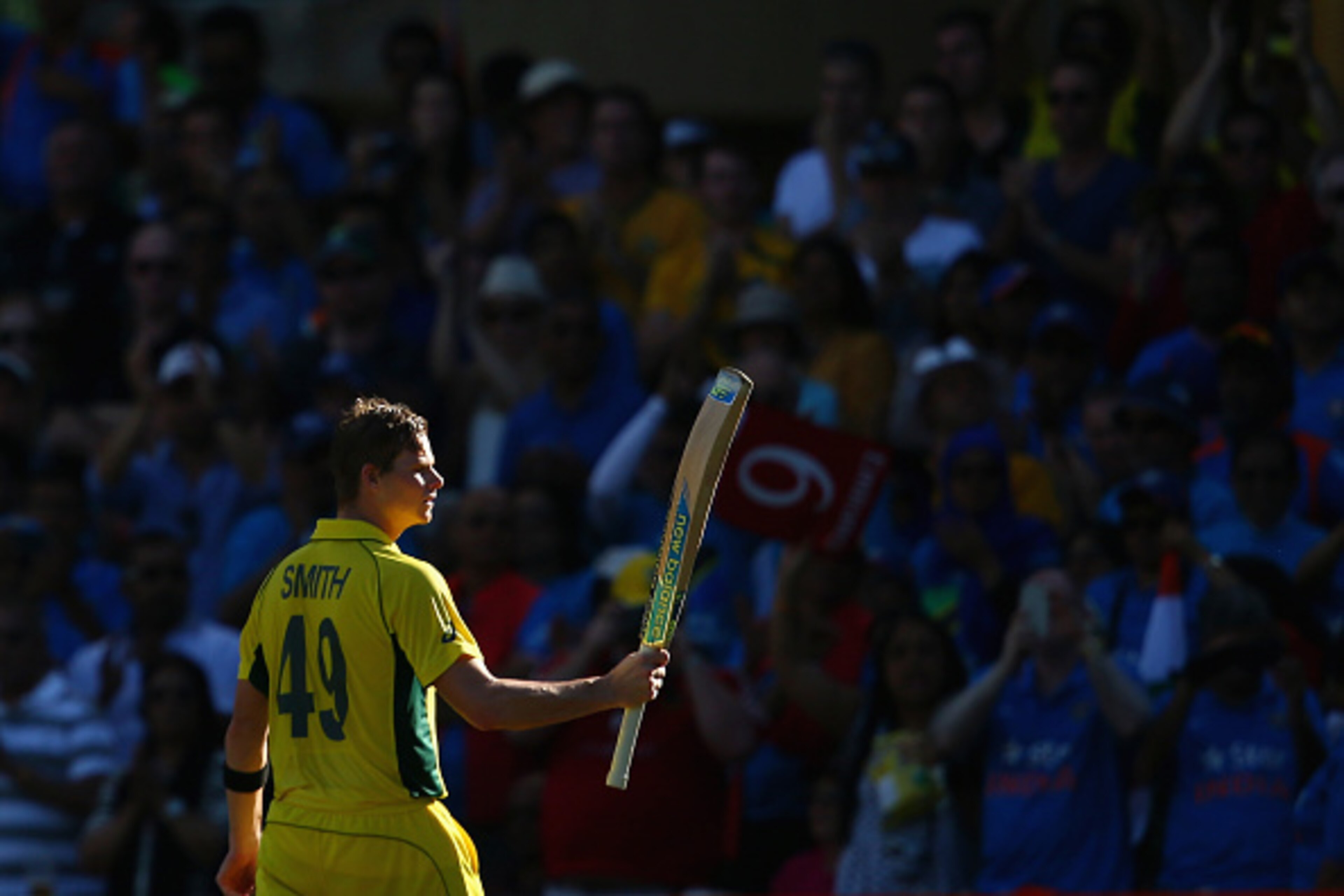 SYDNEY, AUSTRALIA - MARCH 26: Steve Smith of Australia acknowledges the crowd as he leaves the field after being dismissed for 105 during the 2015 Cricket World Cup Semi Final match between Australia and India at Sydney Cricket Ground on March 26, 2015 in
