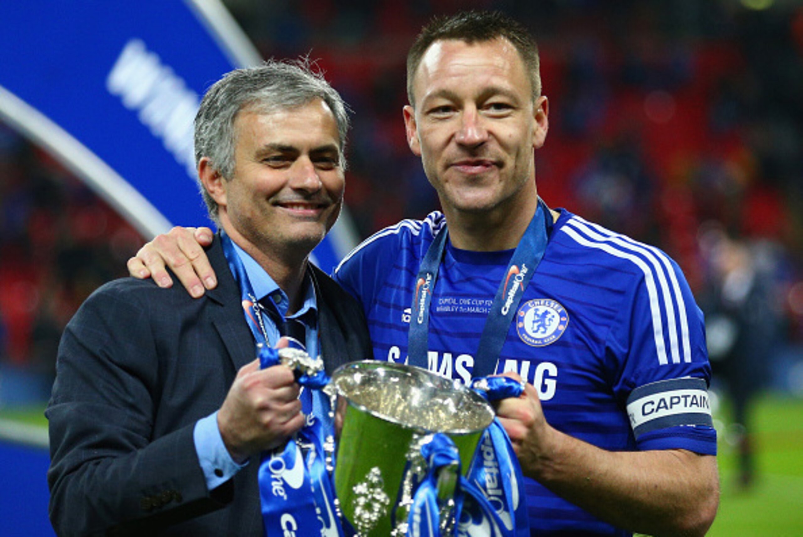 LONDON, ENGLAND - MARCH 01:  Manager Jose Mourinho of Chelsea and John Terry of Chelsea pose with the trophy during the Capital One Cup Final match between Chelsea and Tottenham Hotspur at Wembley Stadium on March 1, 2015 in London, England.  (Photo by Cl