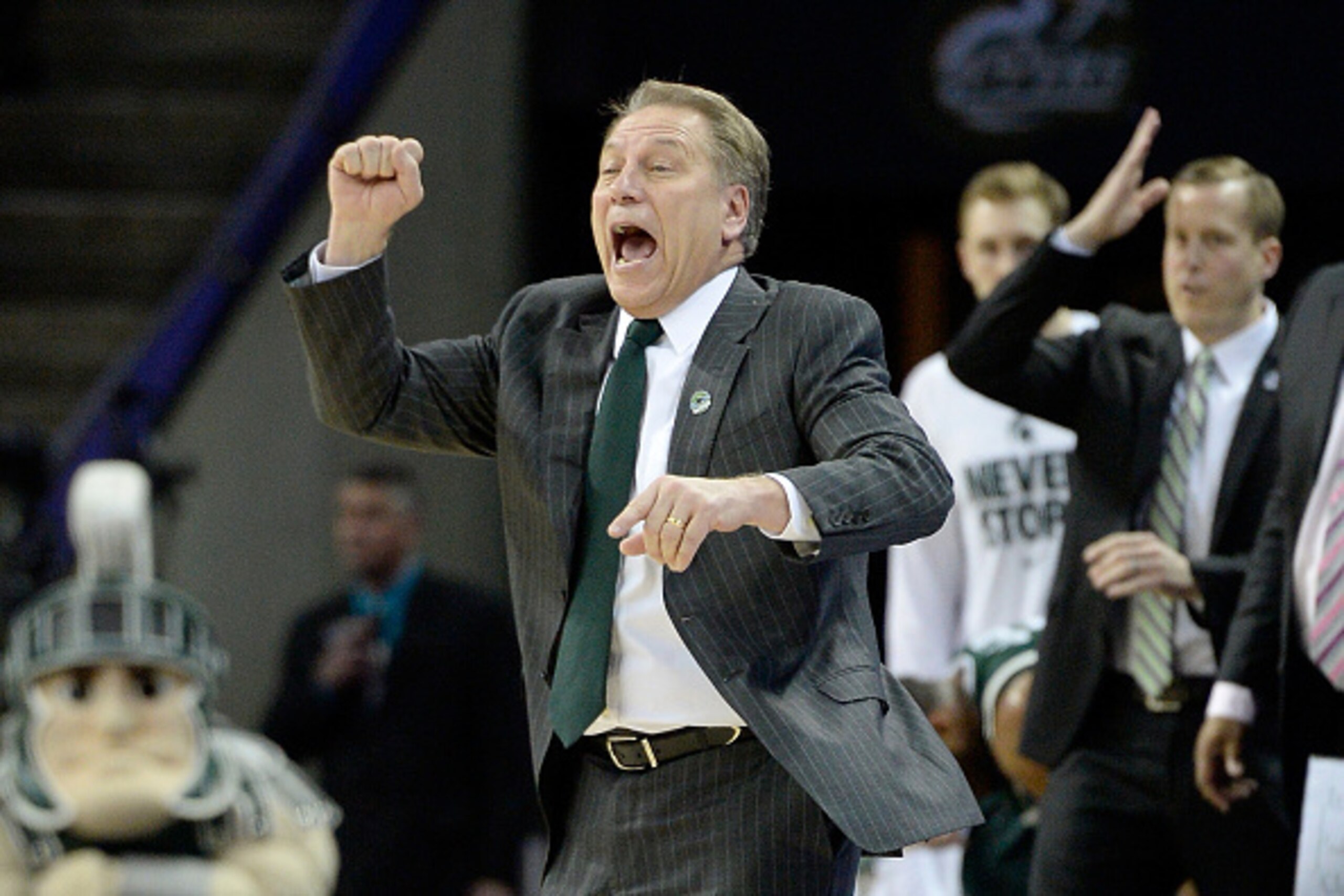 CHARLOTTE, NC - MARCH 22:  Head coach Tom Izzo of the Michigan State Spartans reacts against the Virginia Cavaliers during the third round of the 2015 NCAA Men's Basketball Tournament at Time Warner Cable Arena on March 22, 2015 in Charlotte, North Caroli