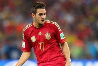 RIO DE JANEIRO, BRAZIL - JUNE 18: Koke of Spain controls the ball during the 2014 FIFA World Cup Brazil Group B match between Spain and Chile at Maracana on June 18, 2014 in Rio de Janeiro, Brazil.  (Photo by Jamie Squire/Getty Images)