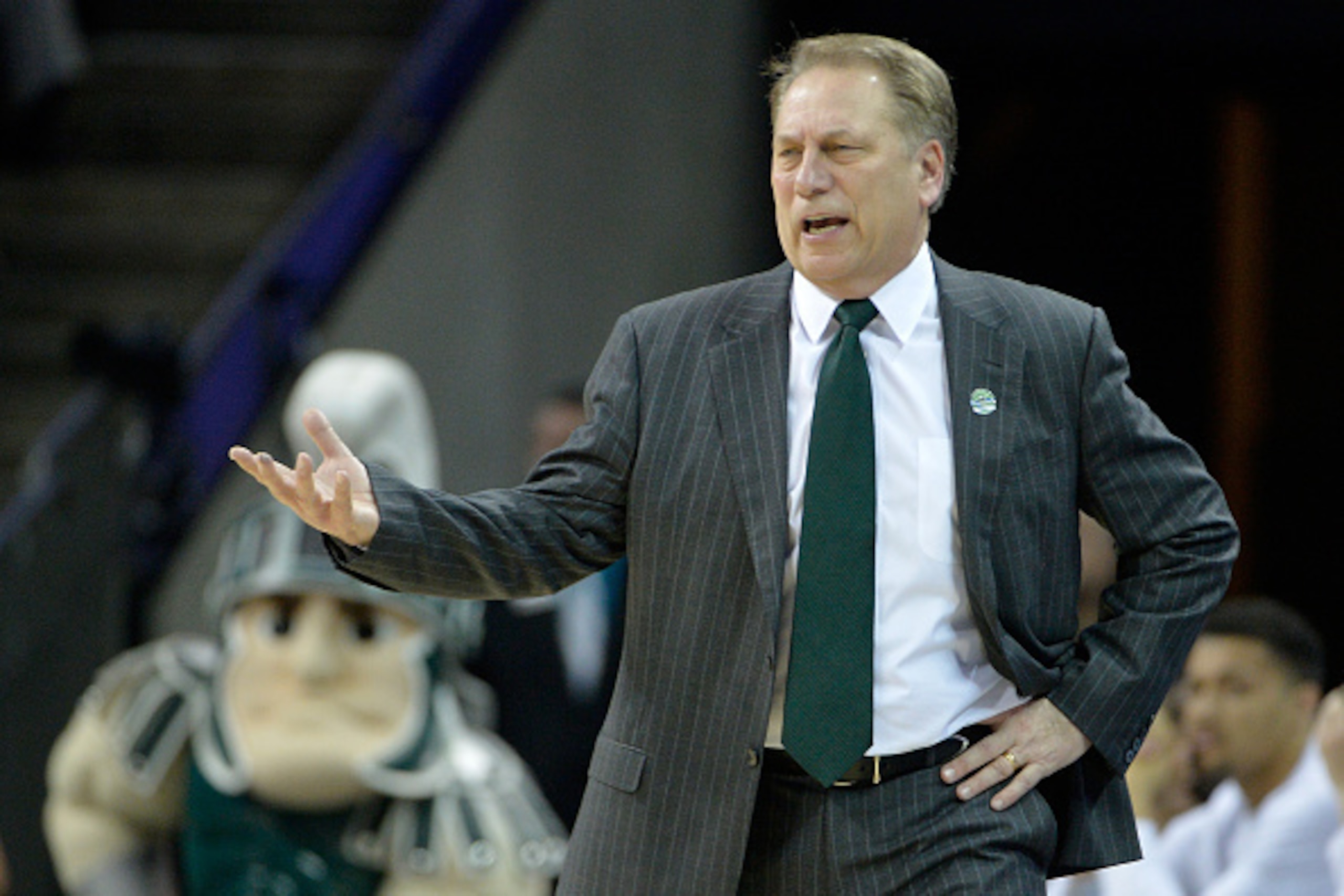 CHARLOTTE, NC - MARCH 22: Head coach Tom Izzo of the Michigan State Spartans reacts against the Virginia Cavaliers during the third round of the 2015 NCAA Men's Basketball Tournament at Time Warner Cable Arena on March 22, 2015 in Charlotte, North Caroli CHARLOTTE, NC - MARCH 22: Head coach Tom Izzo of the Michigan State Spartans reacts against the Virginia Cavaliers during the third round of the 2015 NCAA Men's Basketball Tournament at Time Warner Cable Arena on March 22, 2015 in Charlotte, North Caroli
