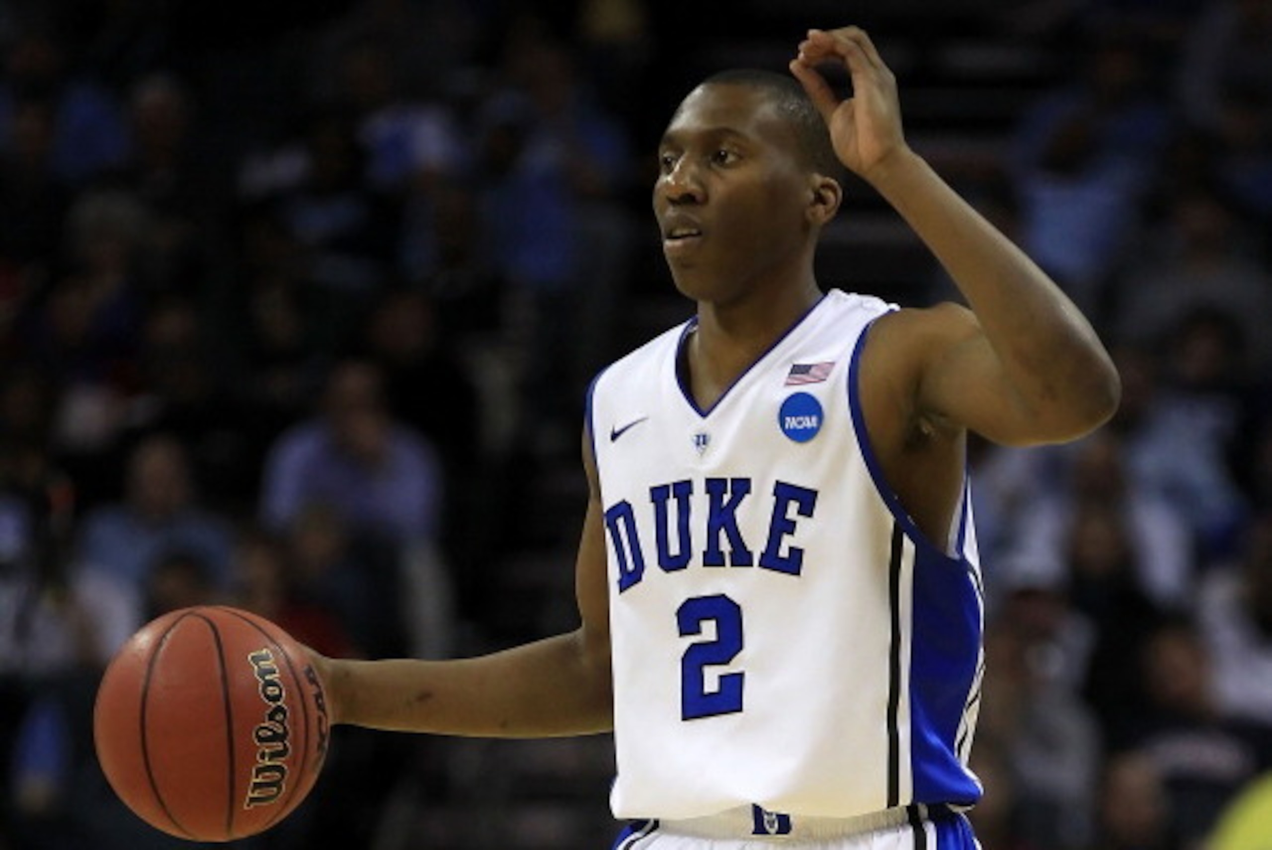 CHARLOTTE, NC - MARCH 20:  Nolan Smith #2 of the Duke Blue Devils moves the ball while taking on the Michigan Wolverines during the third round of the 2011 NCAA men's basketball tournament at Time Warner Cable Arena on March 20, 2011 in Charlotte, North C
