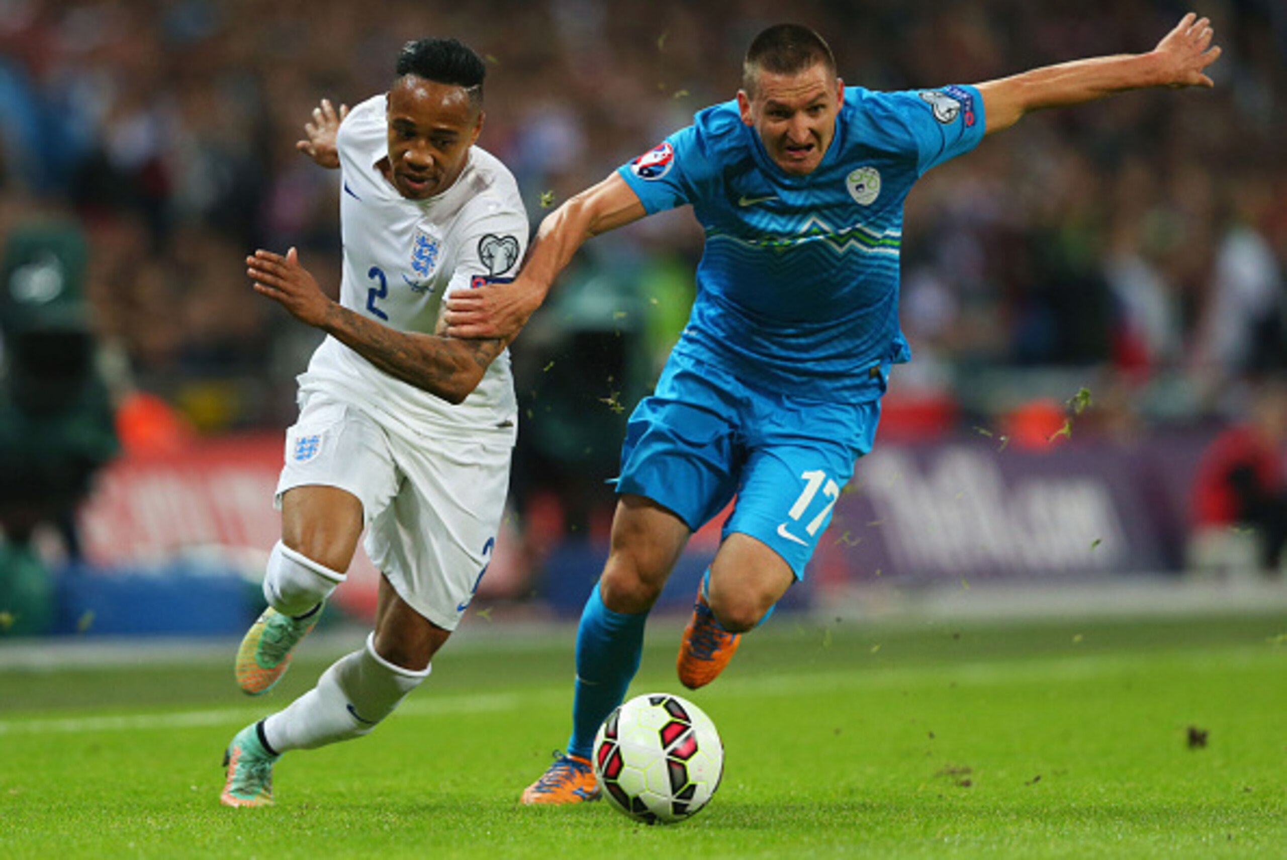 LONDON, ENGLAND - NOVEMBER 15: Nathaniel Clyne of England battles with Andraz Kirm of Slovenia during the EURO 2016 Qualifier Group E match between England and Slovenia at Wembley Stadium on November 15, 2014 in London, England. (Photo by Alex Livesey/G LONDON, ENGLAND - NOVEMBER 15: Nathaniel Clyne of England battles with Andraz Kirm of Slovenia during the EURO 2016 Qualifier Group E match between England and Slovenia at Wembley Stadium on November 15, 2014 in London, England. (Photo by Alex Livesey/G