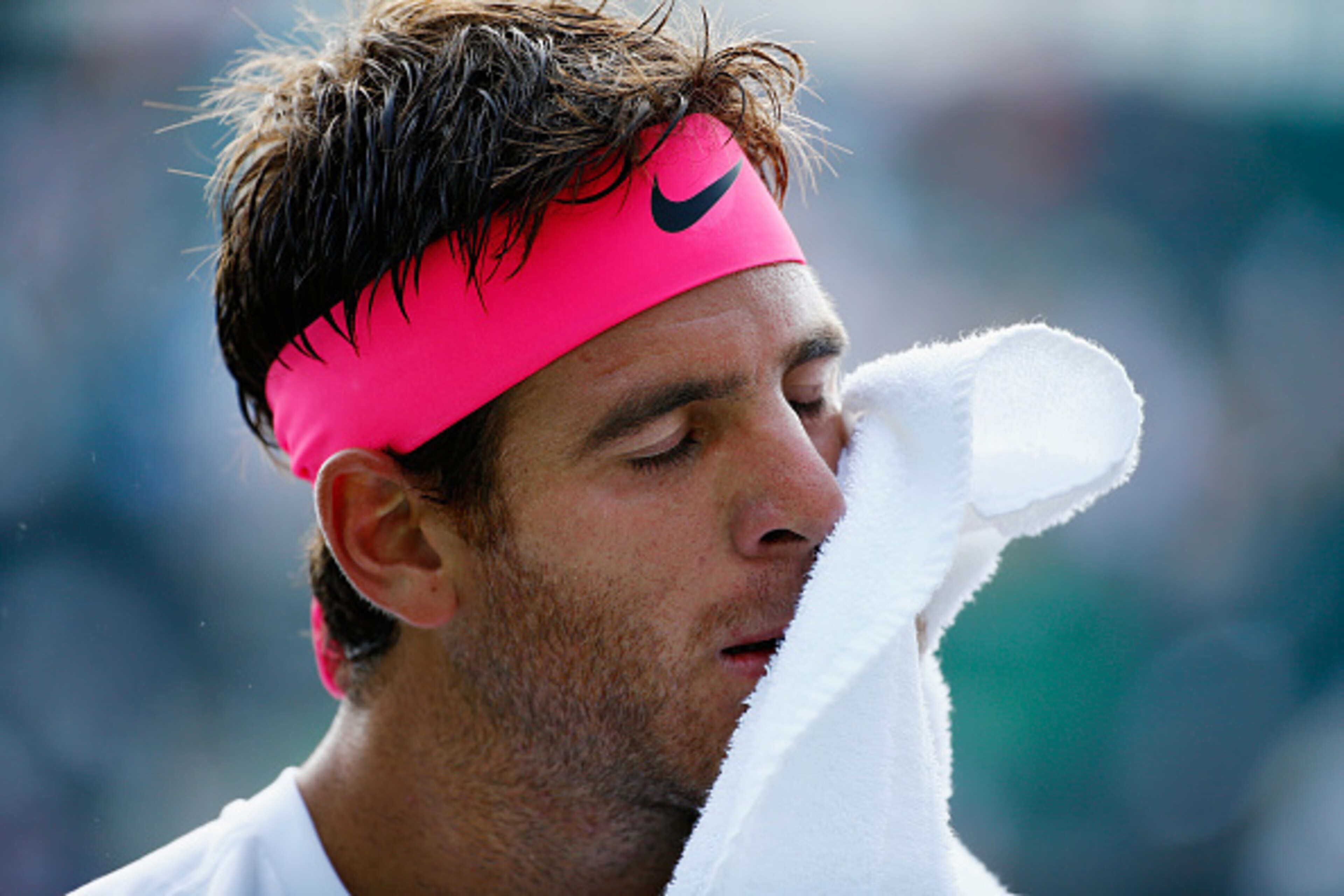 KEY BISCAYNE, FL - MARCH 26:  Juan Martin Del Potro of Argentina reacts to a lost point to Vasek Pospisil of Canada during day 4 of the Miami Open at Crandon Park Tennis Center on March 26, 2015 in Key Biscayne, Florida.  (Photo by Al Bello/Getty Images)