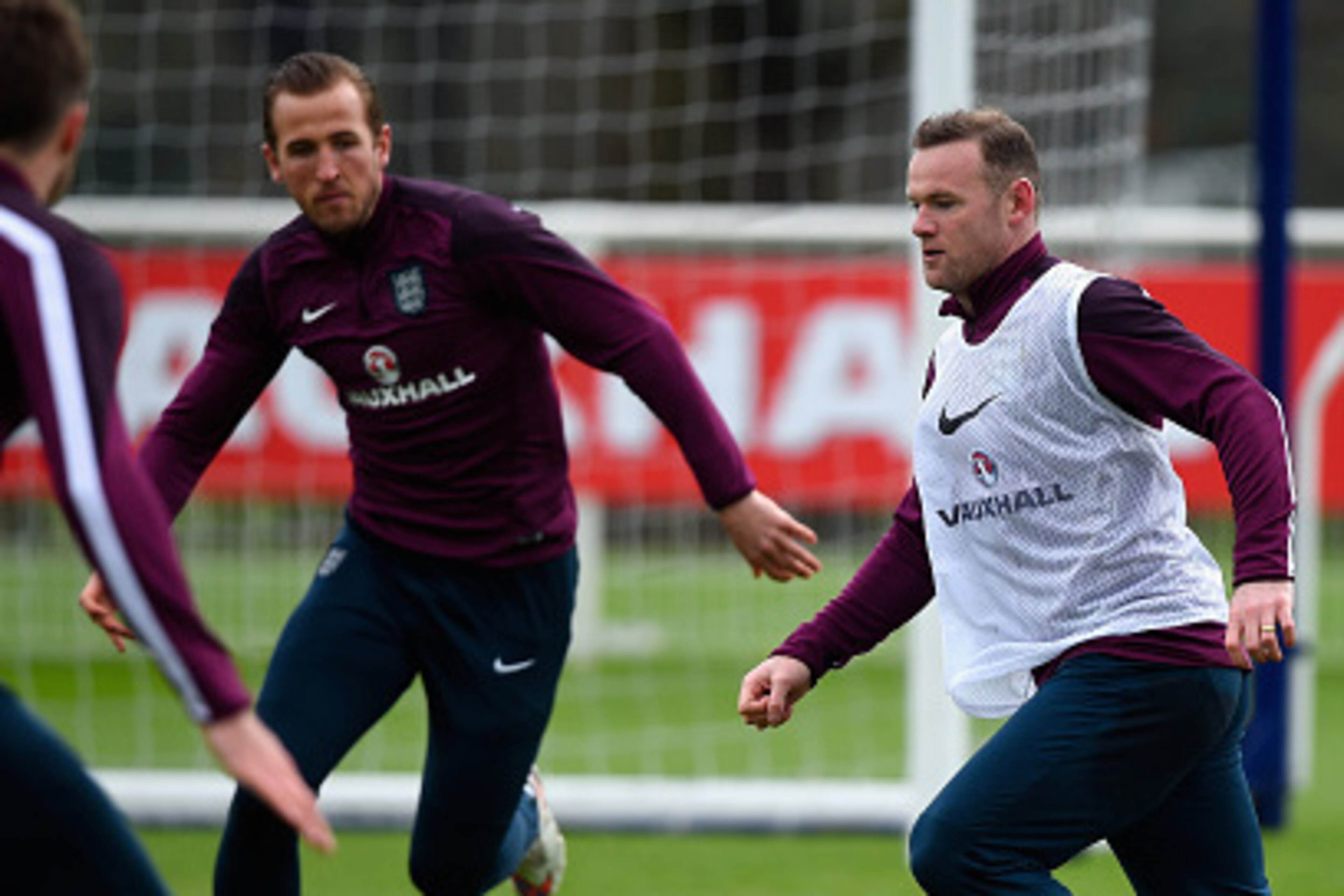 ENFIELD, ENGLAND - MARCH 26:  Harry Kane  and Wayne Rooney of England in action during an England training session ahead of the Euro 2016 qualifier against Lithuania at Enfield Training Centre on March 26, 2015 in Enfield, England.  (Photo by Mike Hewitt/