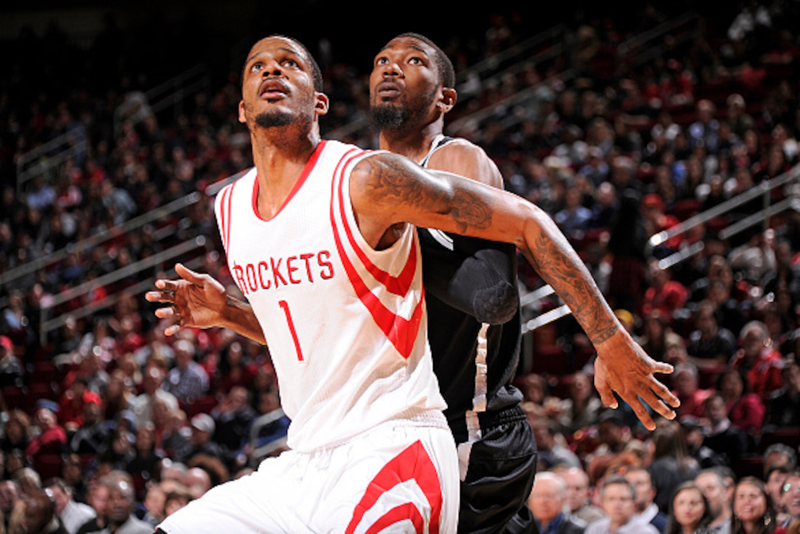 HOUSTON, TX - FEBRUARY 27:  Trevor Ariza #1 of the Houston Rockets boxes out against Cory Jefferson #21 of the Brooklyn Nets during the game on February 27, 2015 at the Toyota Center in Houston, Texas. NOTE TO USER: User expressly acknowledges and agrees 