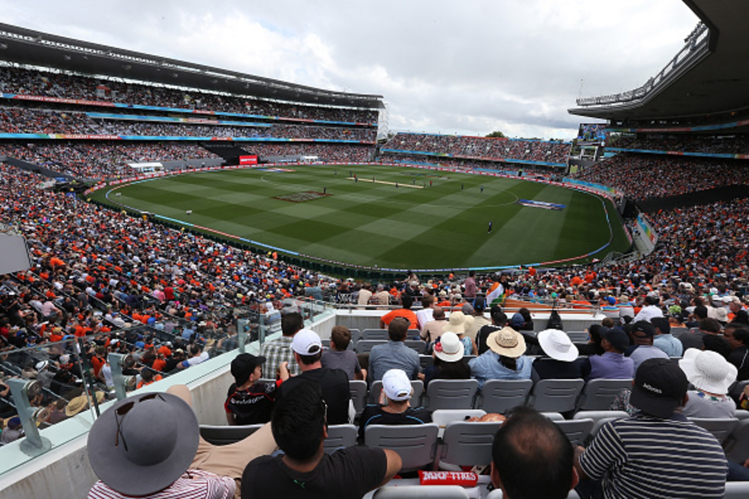 AUCKLAND, NEW ZEALAND - MARCH 24:  Fans watch the Cricket World Cup semi final between South Africa and New Zealand at Eden Park on March 24, 2015 in Auckland, New Zealand.  (Photo by Fiona Goodall/Getty Images for Tourism NZ)