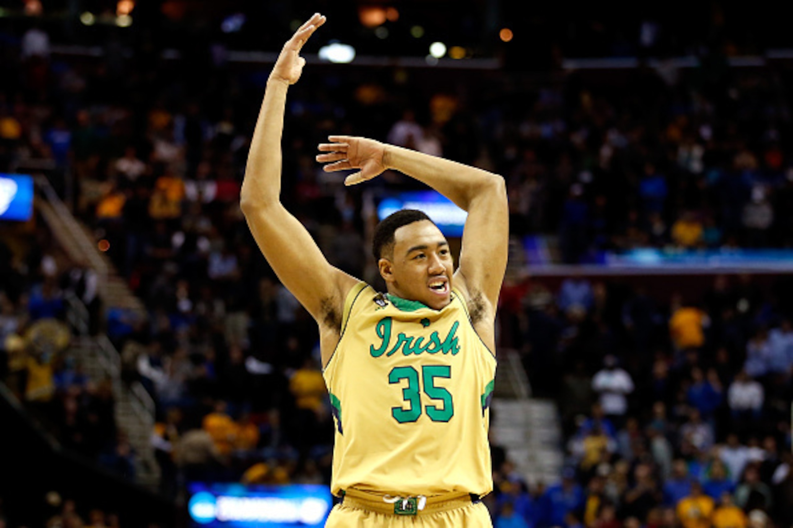 CLEVELAND, OH - MARCH 26: Bonzie Colson #35 of the Notre Dame Fighting Irish celebrates after defeating the Wichita State Shockers during the Midwest Regional semifinal of the 2015 NCAA Men's Basketball Tournament at Quicken Loans Arena on March 26, 2015 