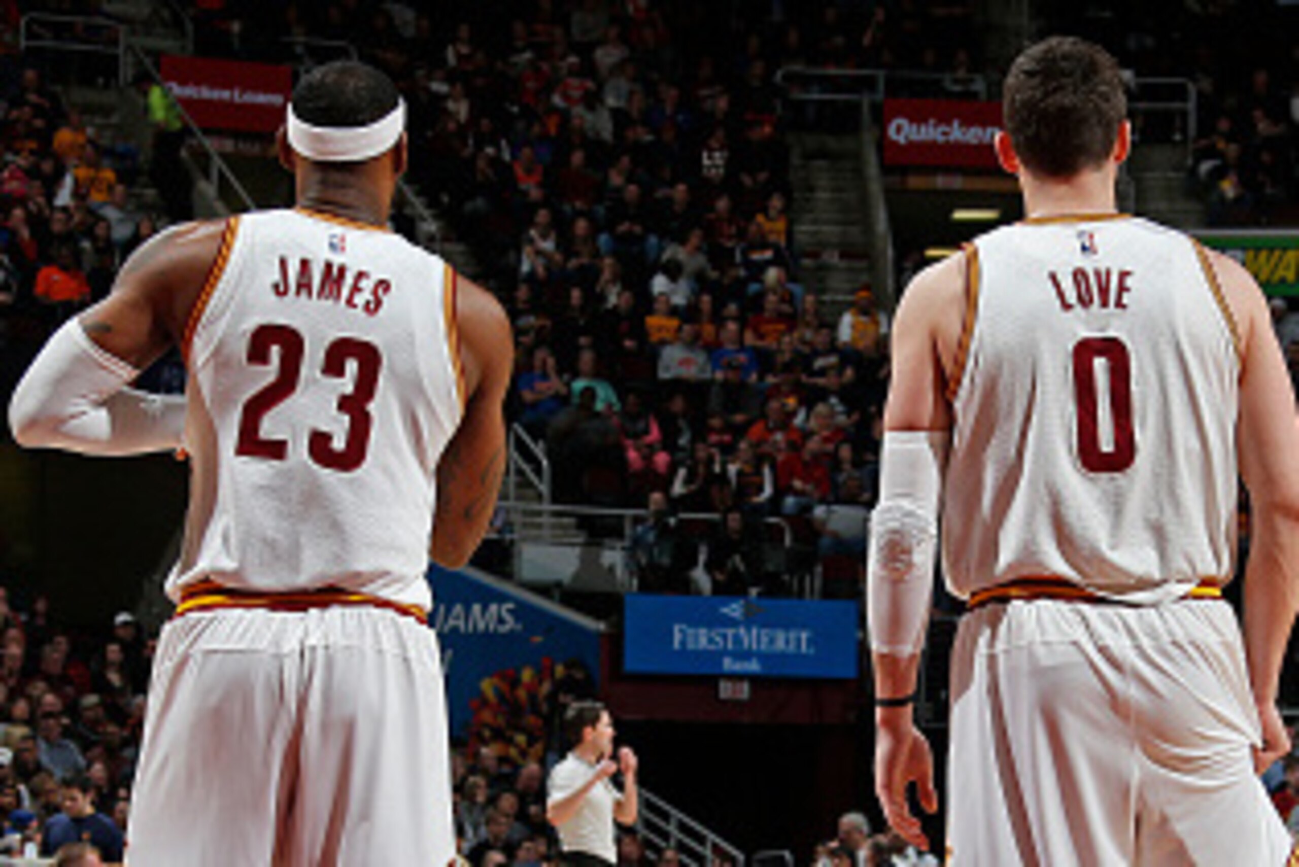 CLEVELAND, OH - MARCH 7: LeBron James #23 and Kevin Love #0 of the Cleveland Cavaliers stand on the court during a game against the Phoenix Suns at The Quicken Loans Arena on March 7, 2015 in Cleveland, Ohio. NOTE TO USER: User expressly acknowledges and 