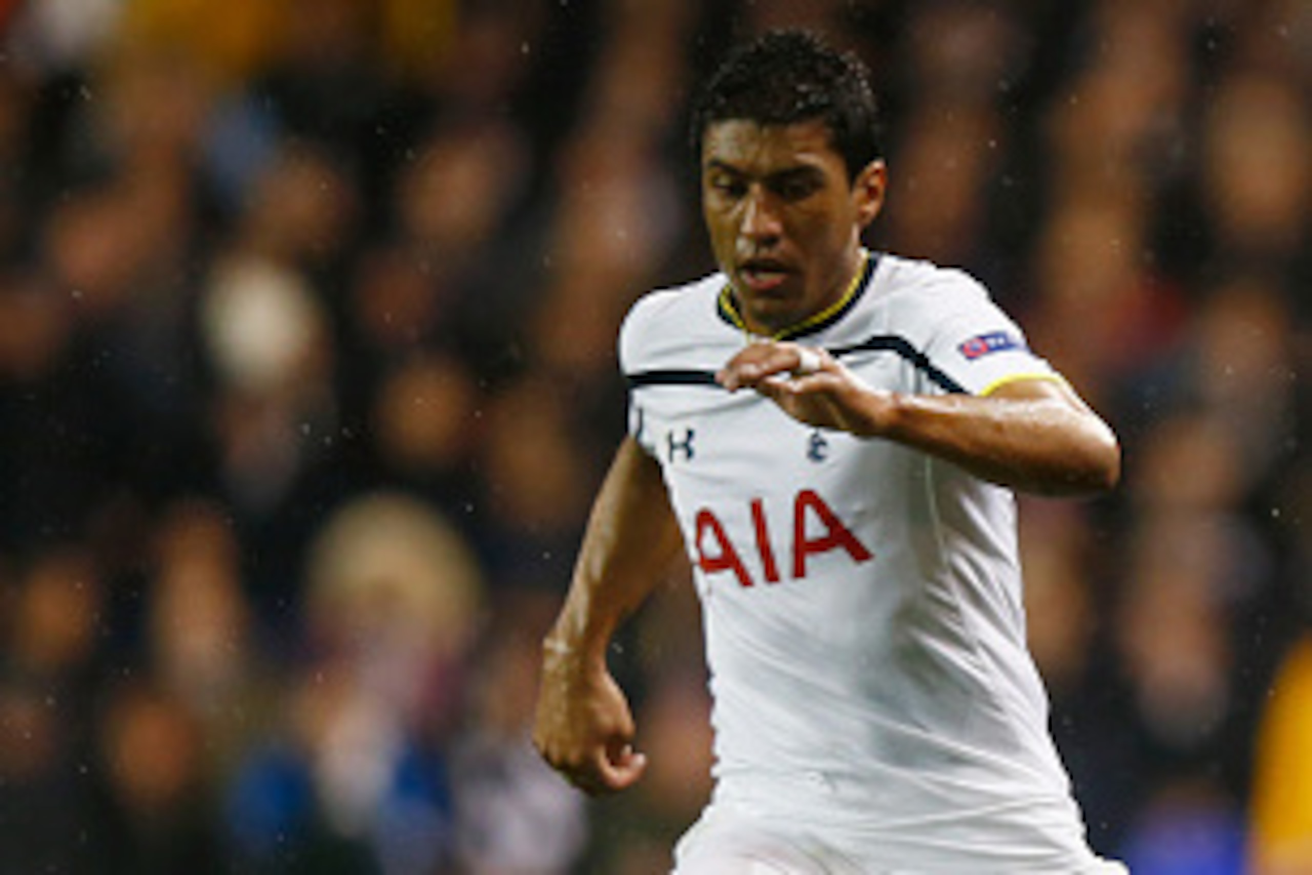 LONDON, ENGLAND - FEBRUARY 19:  Stefan Savic of Fiorentina clears the ball from Paulinho of Spurs during the UEFA Europa League Round of 32 first leg match between Tottenham Hotspur FC and ACF Fiorentina at White Hart Lane on February 19, 2015 in London,