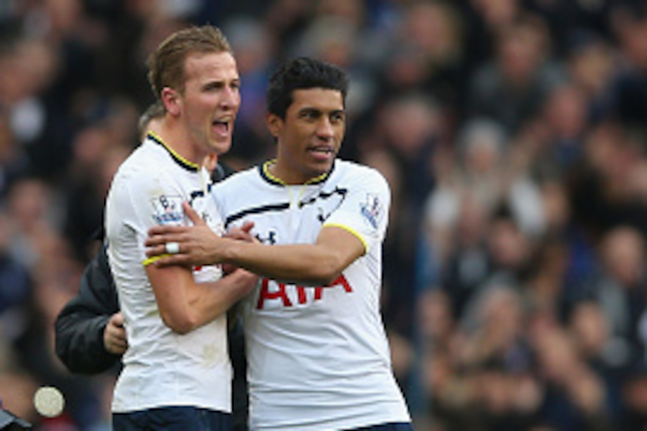 LONDON, ENGLAND - FEBRUARY 07:  Harry Kane of Tottenham Hotspur celebrates with Paulino as a television camera films him at the end of the Barclays Premier League match between Tottenham Hotspur and Arsenal at White Hart Lane on February 7, 2015 in London