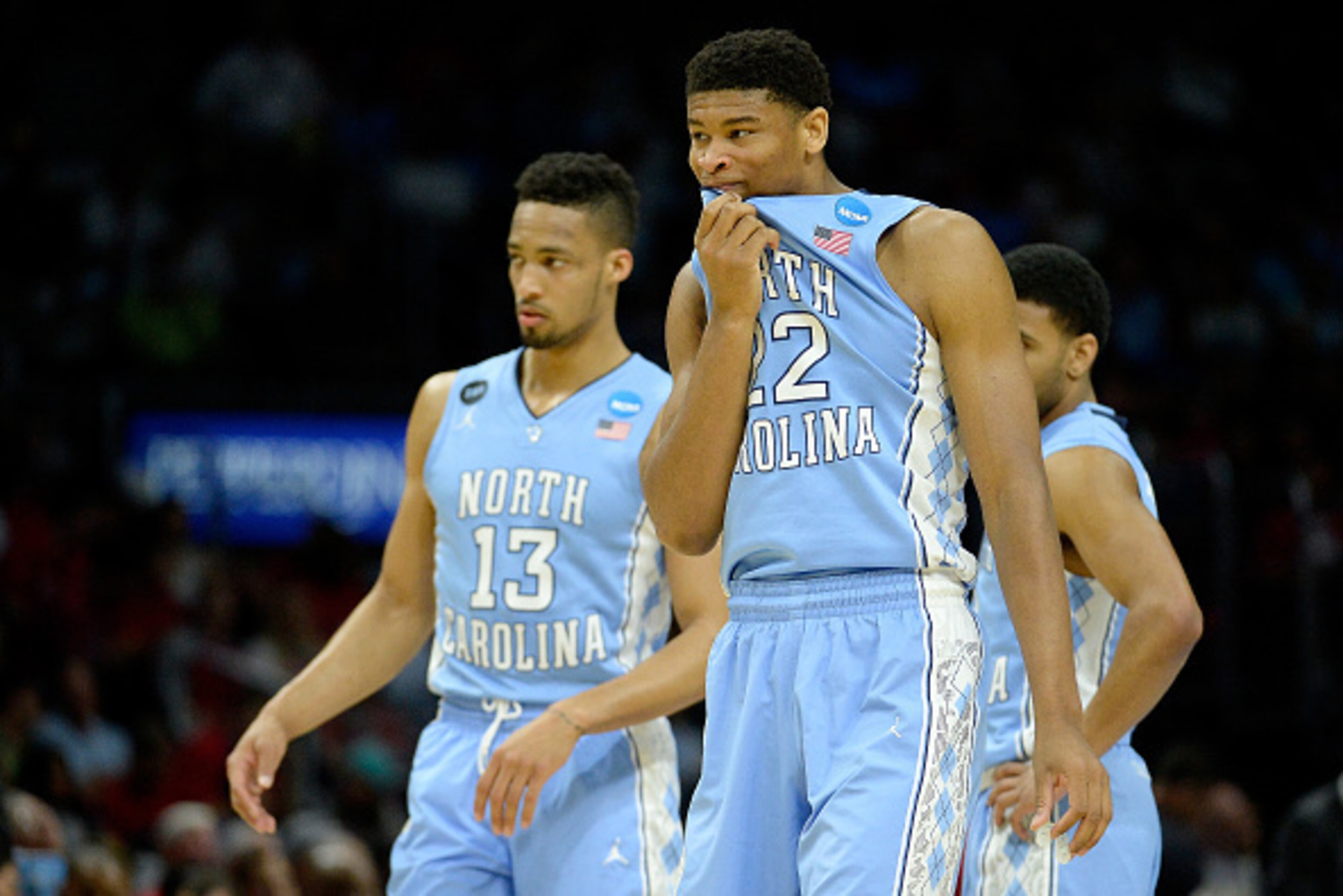 LOS ANGELES, CA - MARCH 26:  Isaiah Hicks #22 and J.P. Tokoto #13 of the North Carolina Tar Heels react in the second half while taking on the Wisconsin Badgers during the West Regional Semifinal of the 2015 NCAA Men's Basketball Tournament at Staples Cen
