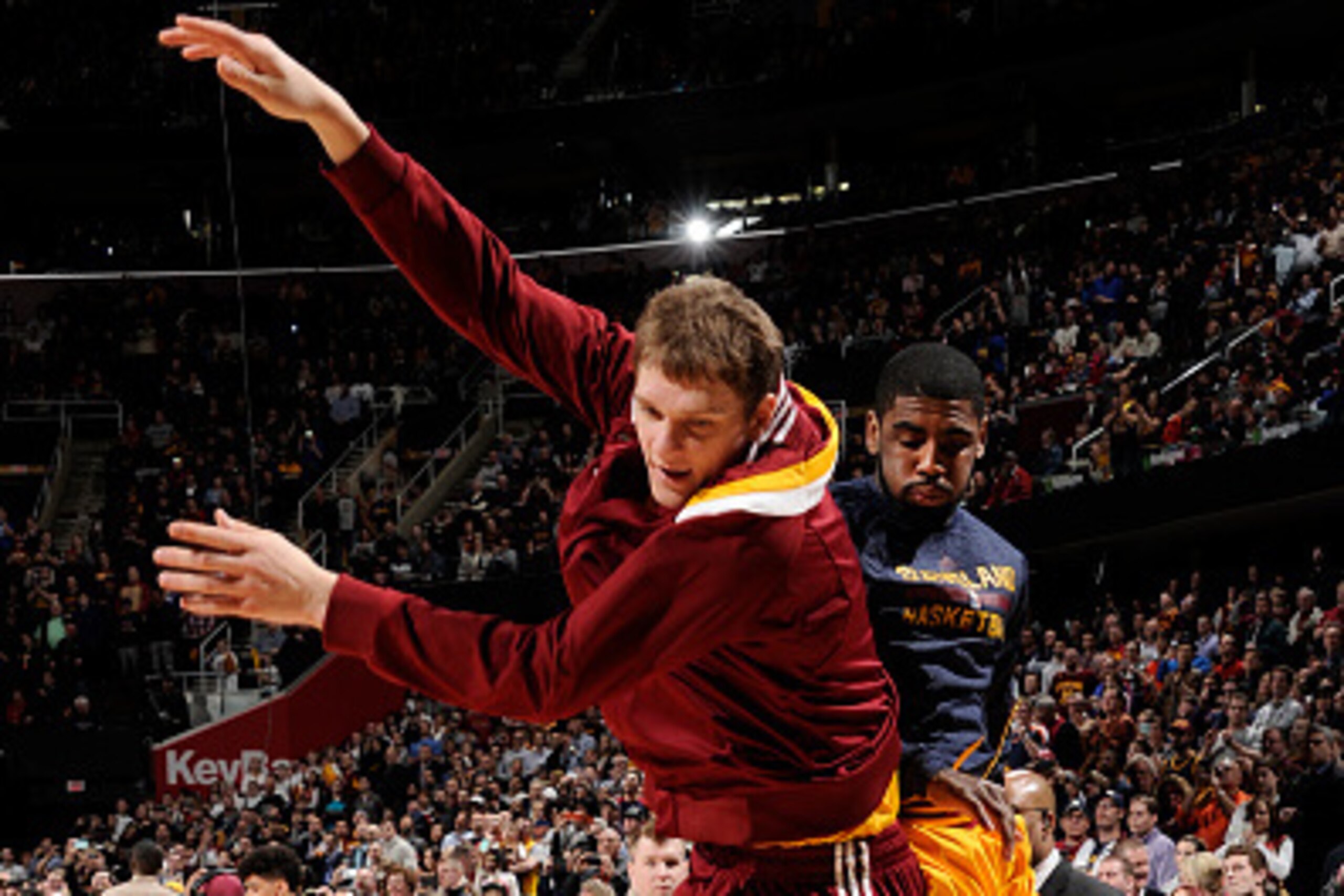 CLEVELAND, OH - MARCH 18: Timofey Mozgov #20 and Kyrie Irving #2 of the Cleveland Cavaliers before the game against the Brooklyn Nets on March 18, 2015 at Quicken Loans Arena in Cleveland, Ohio. NOTE TO USER: User expressly acknowledges and agrees that, b