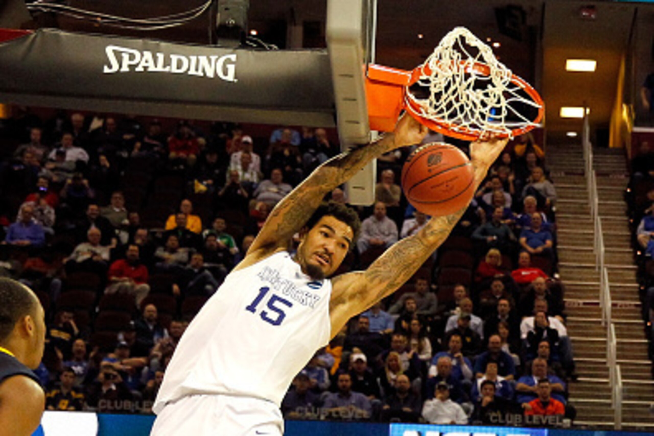 CLEVELAND, OH - MARCH 26:  Willie Cauley-Stein #15 of the Kentucky Wildcats goes up for a dunk in the second half against the West Virginia Mountaineers during the Midwest Regional semifinal of the 2015 NCAA Men's Basketball Tournament at Quicken Loans Ar