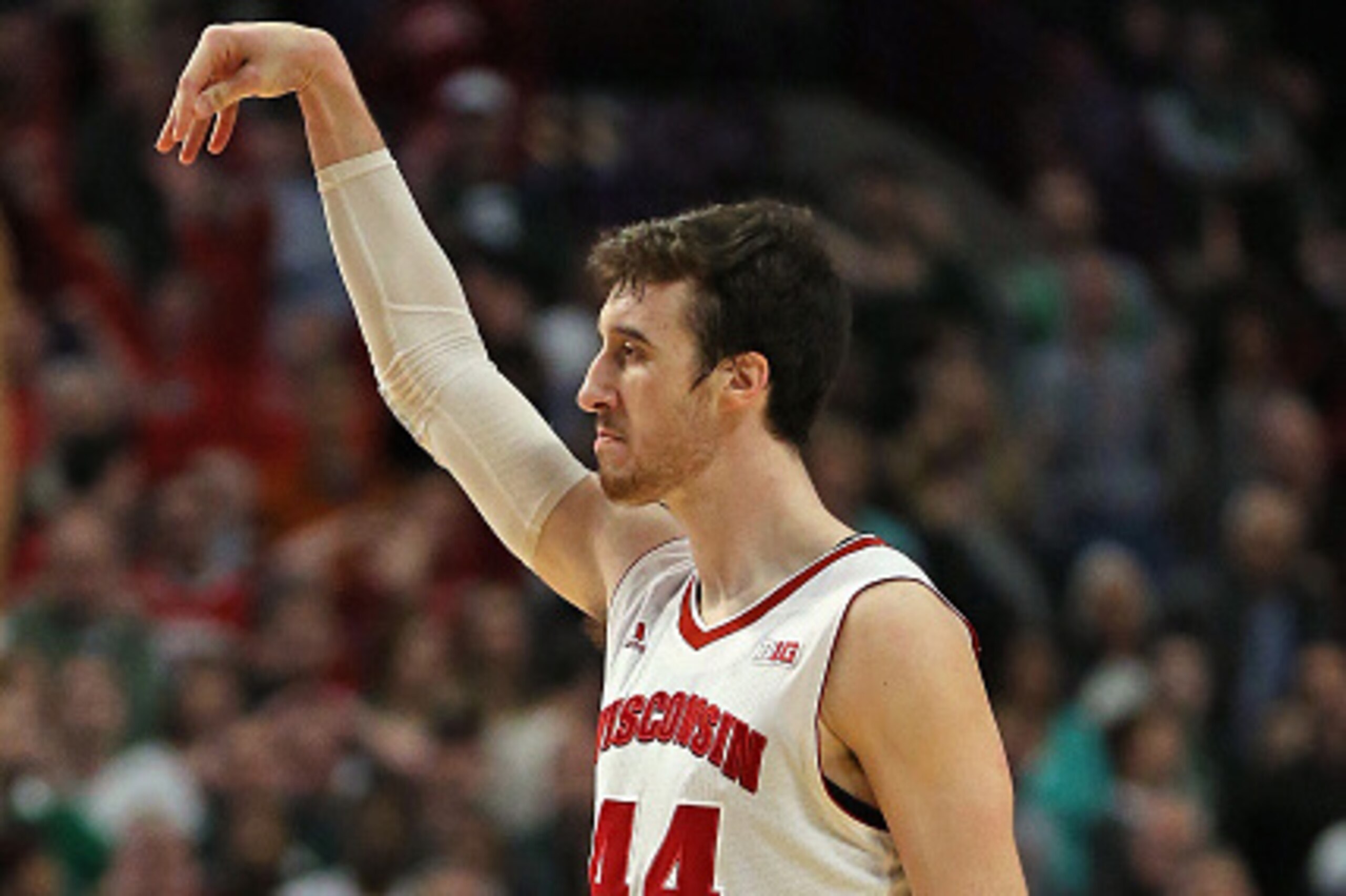 CHICAGO, IL - MARCH 15:  Frank Kaminsky #44 of the Wisconsin Badgers holds up his arm after hitting a three point shot against the Michigan State Spartans during the Championship game of the 2015 Big Ten Men's Basketball Tournament at the United Center on