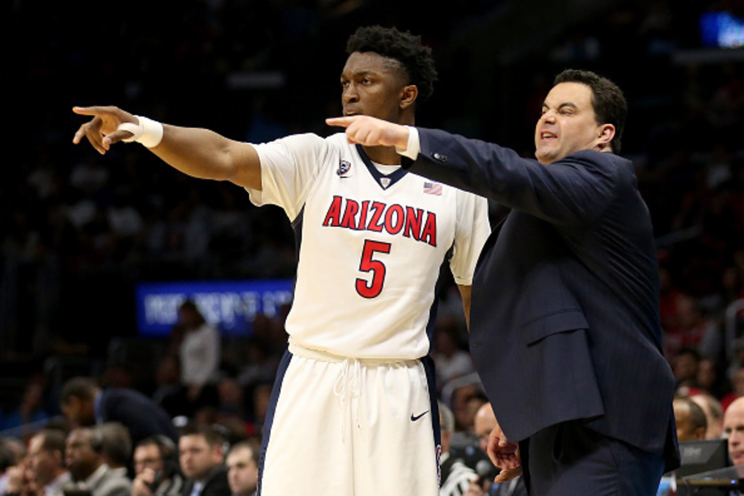 LOS ANGELES, CA - MARCH 26: Stanley Johnson #5 and head coach Sean Miller of the Arizona Wildcats point in the second half while taking on the Xavier Musketeers during the West Regional Semifinal of the 2015 NCAA Men's Basketball Tournament at Staples Ce LOS ANGELES, CA - MARCH 26: Stanley Johnson #5 and head coach Sean Miller of the Arizona Wildcats point in the second half while taking on the Xavier Musketeers during the West Regional Semifinal of the 2015 NCAA Men's Basketball Tournament at Staples Ce
