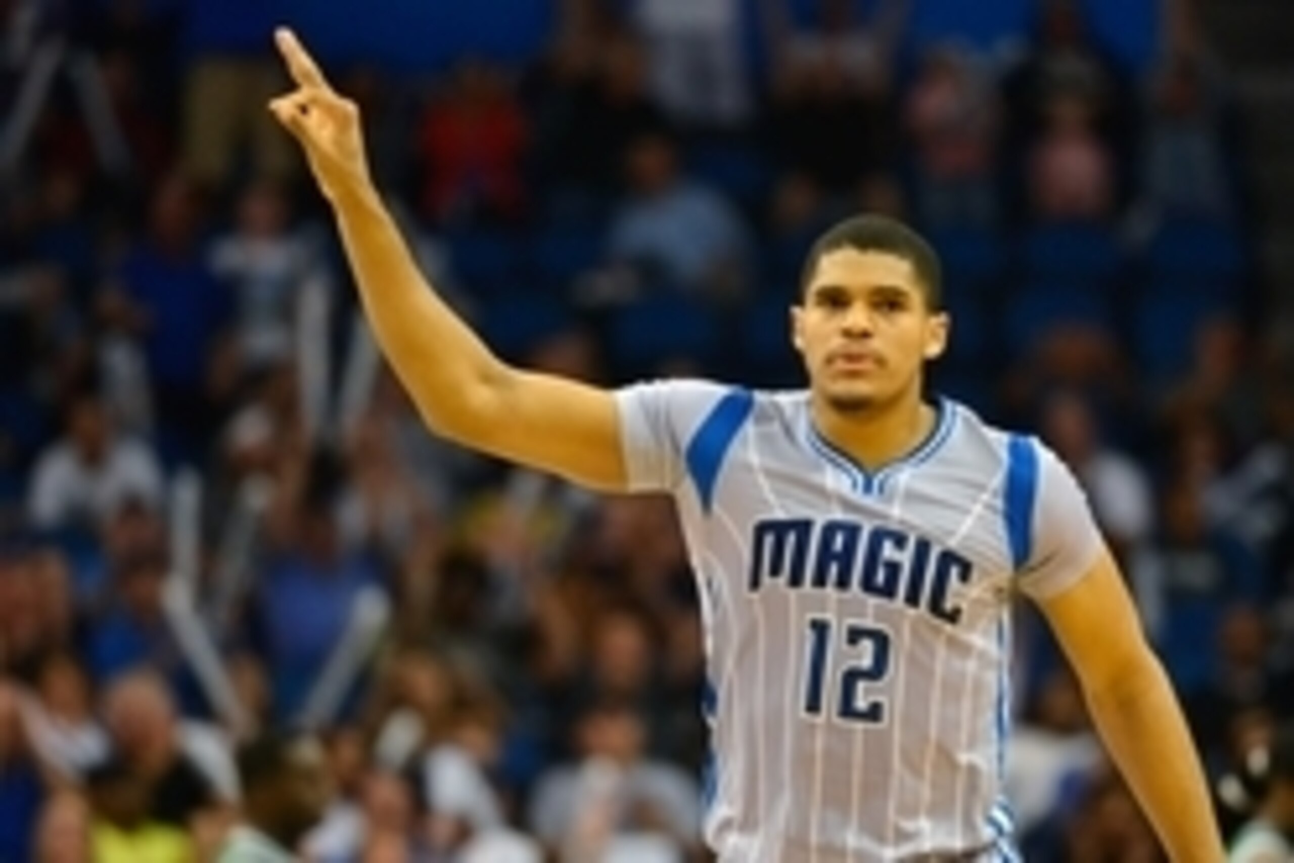 Mar 8, 2015; Orlando, FL, USA; Orlando Magic forward Tobias Harris (12) reacts after hitting a thee point shot during the second half against the Boston Celtics at Amway Center. Orlando Magic defeated Boston Celtics 103-98. Mandatory Credit: Tommy Gilliga