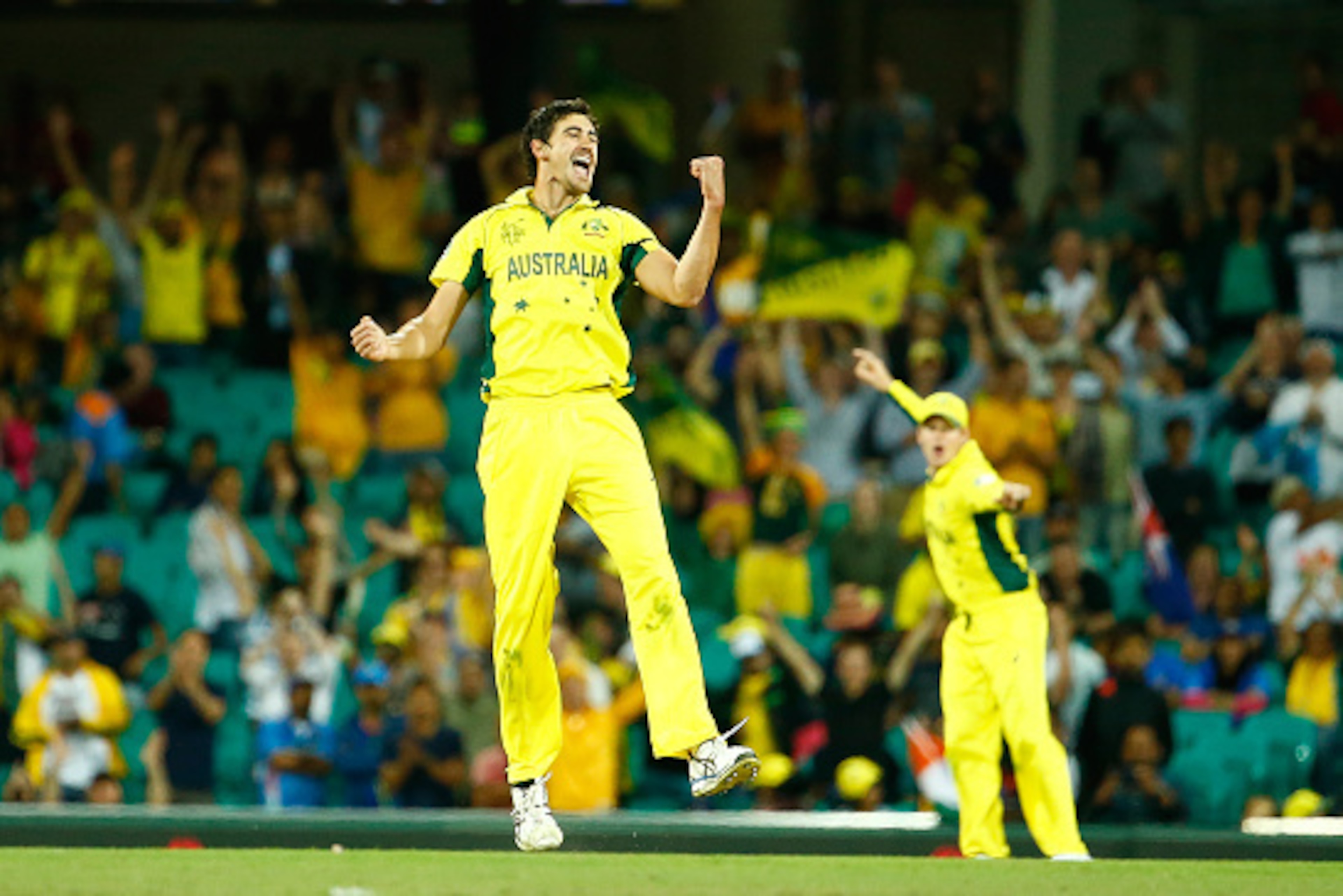 SYDNEY, AUSTRALIA - MARCH 26:  Mitchell Starc of Australia celebrates taking the final wicket during the 2015 Cricket World Cup Semi Final match between Australia and India at Sydney Cricket Ground on March 26, 2015 in Sydney, Australia.  (Photo by Daniel