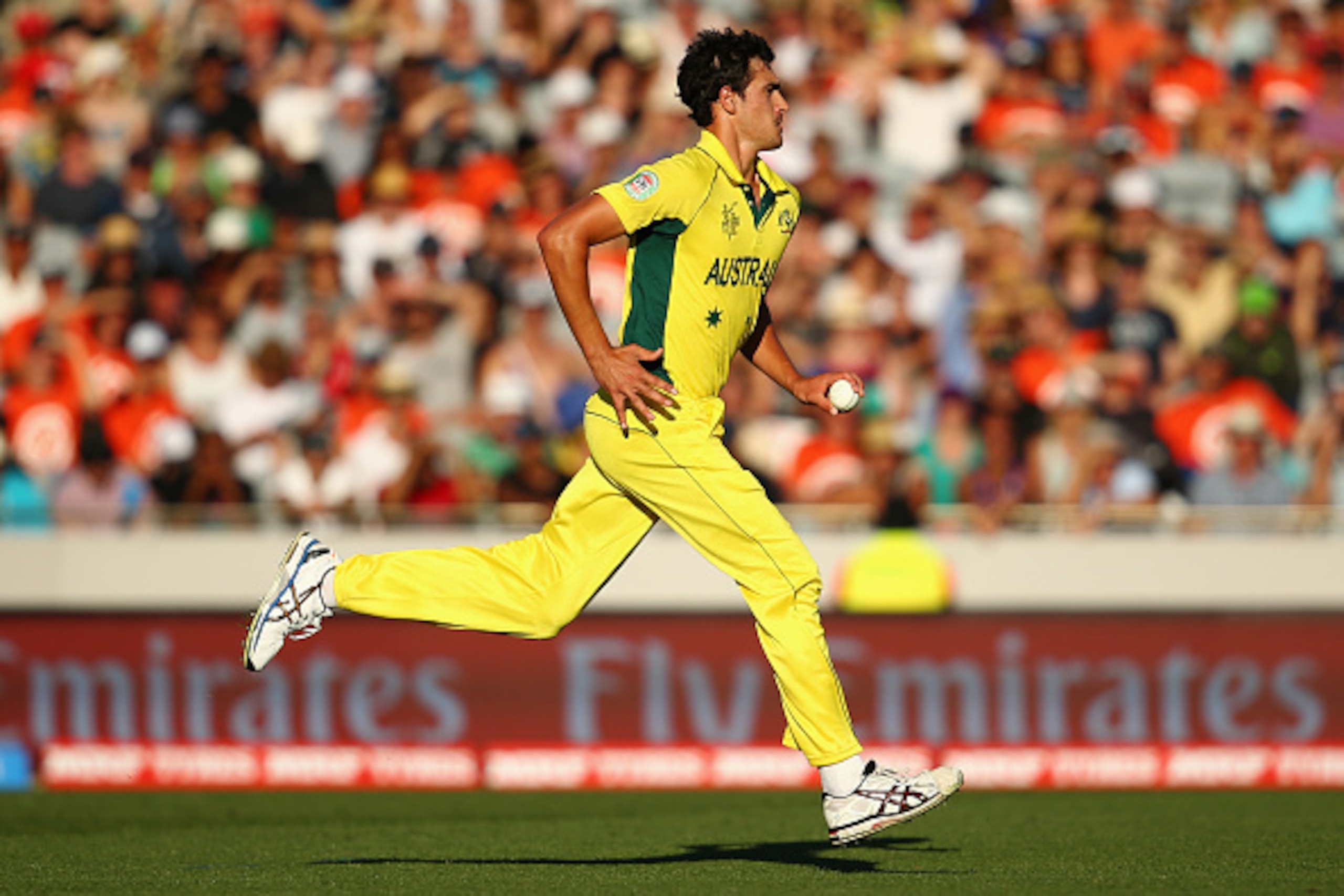 AUCKLAND, NEW ZEALAND - FEBRUARY 28:  Mitchell Starc of Australia runs in to bowl during the 2015 ICC Cricket World Cup match between Australia and New Zealand at Eden Park on February 28, 2015 in Auckland, New Zealand.  (Photo by Mark Kolbe/Getty Images)