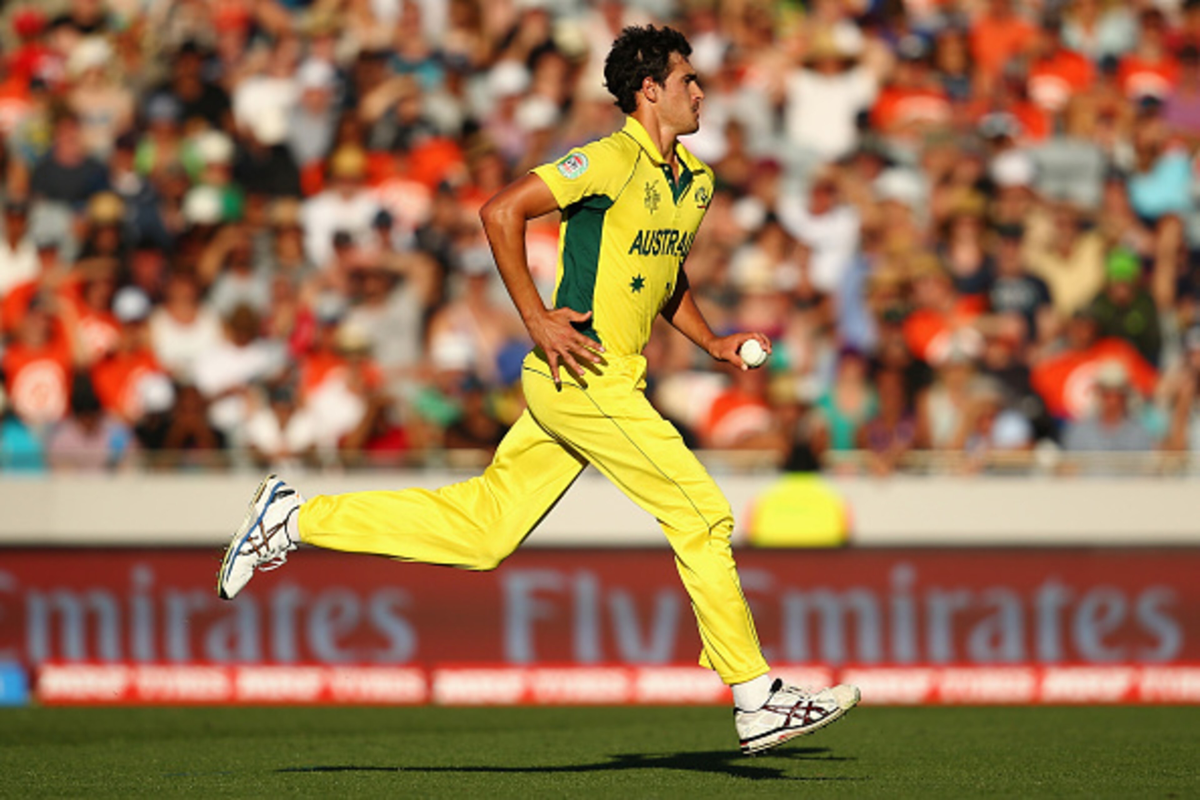 AUCKLAND, NEW ZEALAND - FEBRUARY 28:  Mitchell Starc of Australia runs in to bowl during the 2015 ICC Cricket World Cup match between Australia and New Zealand at Eden Park on February 28, 2015 in Auckland, New Zealand.  (Photo by Mark Kolbe/Getty Images)