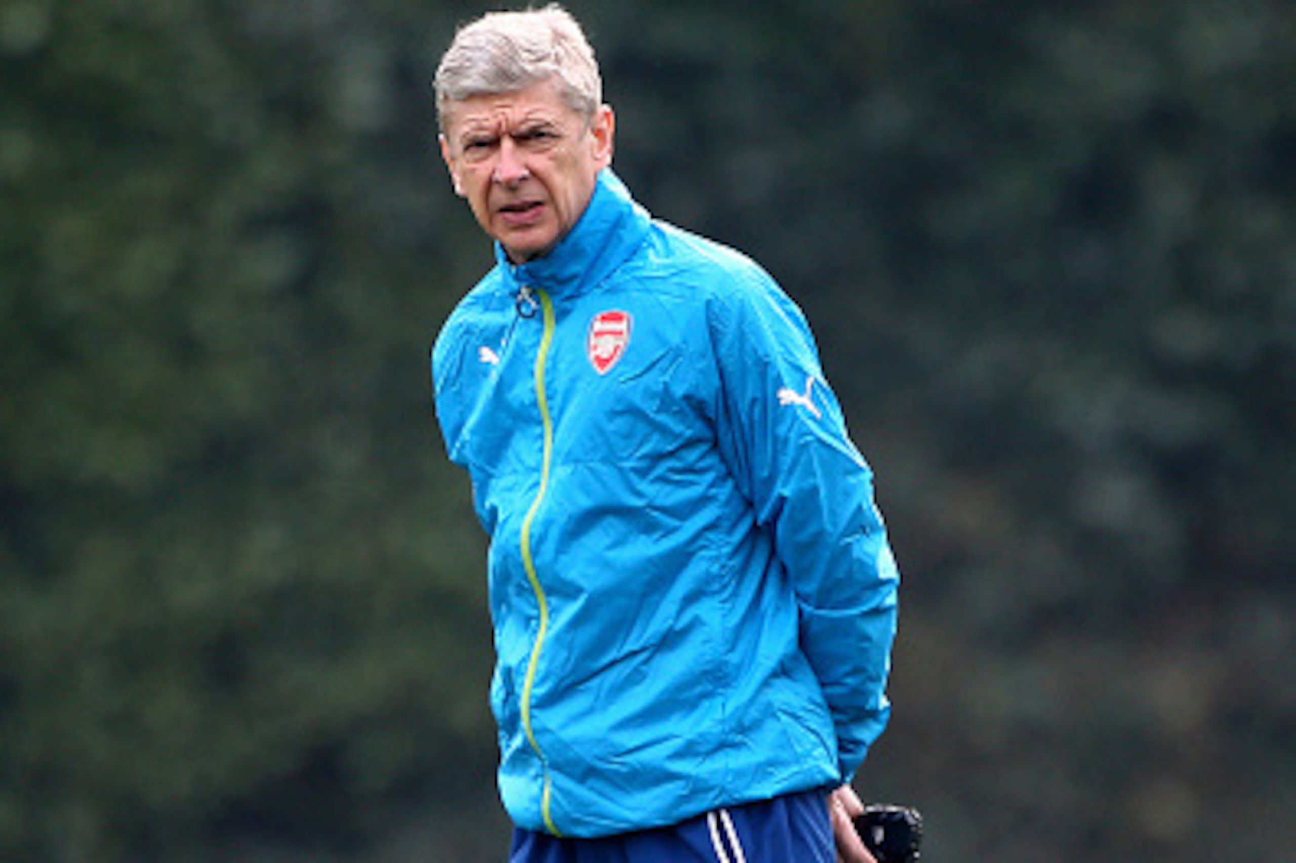 ST ALBANS, ENGLAND - MARCH 16: Arsenal manager Arsene Wenger keeps an eye over the training session during the Arsenal Training Session ahead of their Champions League match against AS Monaco on March 16, 2015 in St Albans, England. (Photo by Charlie Crow ST ALBANS, ENGLAND - MARCH 16: Arsenal manager Arsene Wenger keeps an eye over the training session during the Arsenal Training Session ahead of their Champions League match against AS Monaco on March 16, 2015 in St Albans, England. (Photo by Charlie Crow