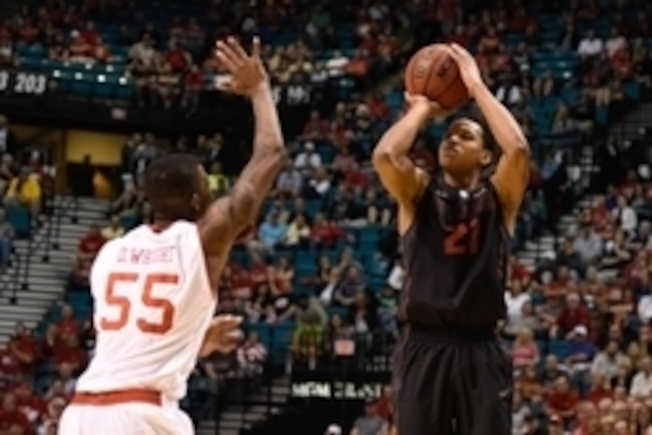 March 12, 2015; Las Vegas, NV, USA; Stanford Cardinal guard/forward Anthony Brown (21) shoots the basketball against Utah Utes guard Delon Wright (55) during the second half in the quarterfinal round of the Pac-12 Conference tournament at MGM Grand Garden