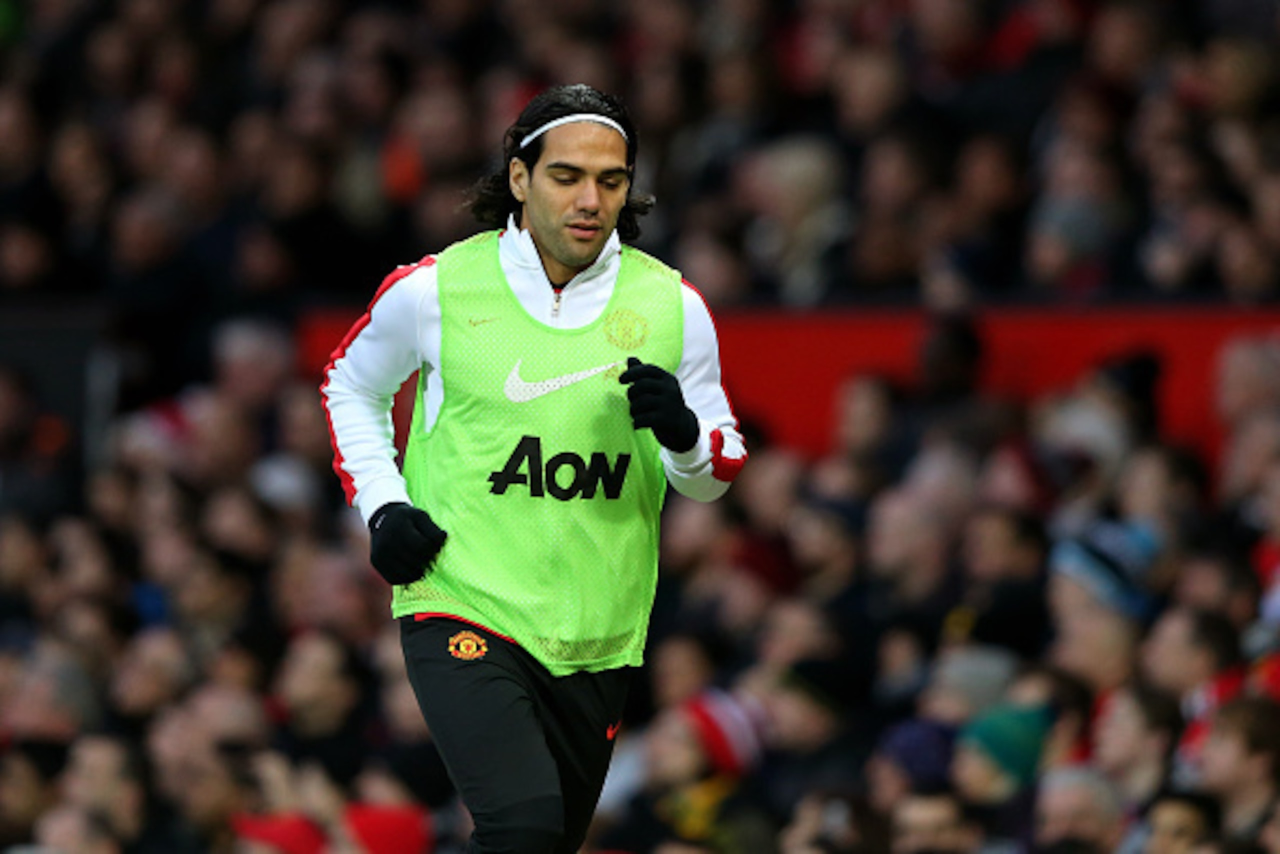 MANCHESTER, ENGLAND - MARCH 15:  Substitute Radamel Falcao of Manchester United warms up prior to coming on in the second half during the Barclays Premier League match between Manchester United and Tottenham Hotspur at Old Trafford on March 15, 2015 in Ma