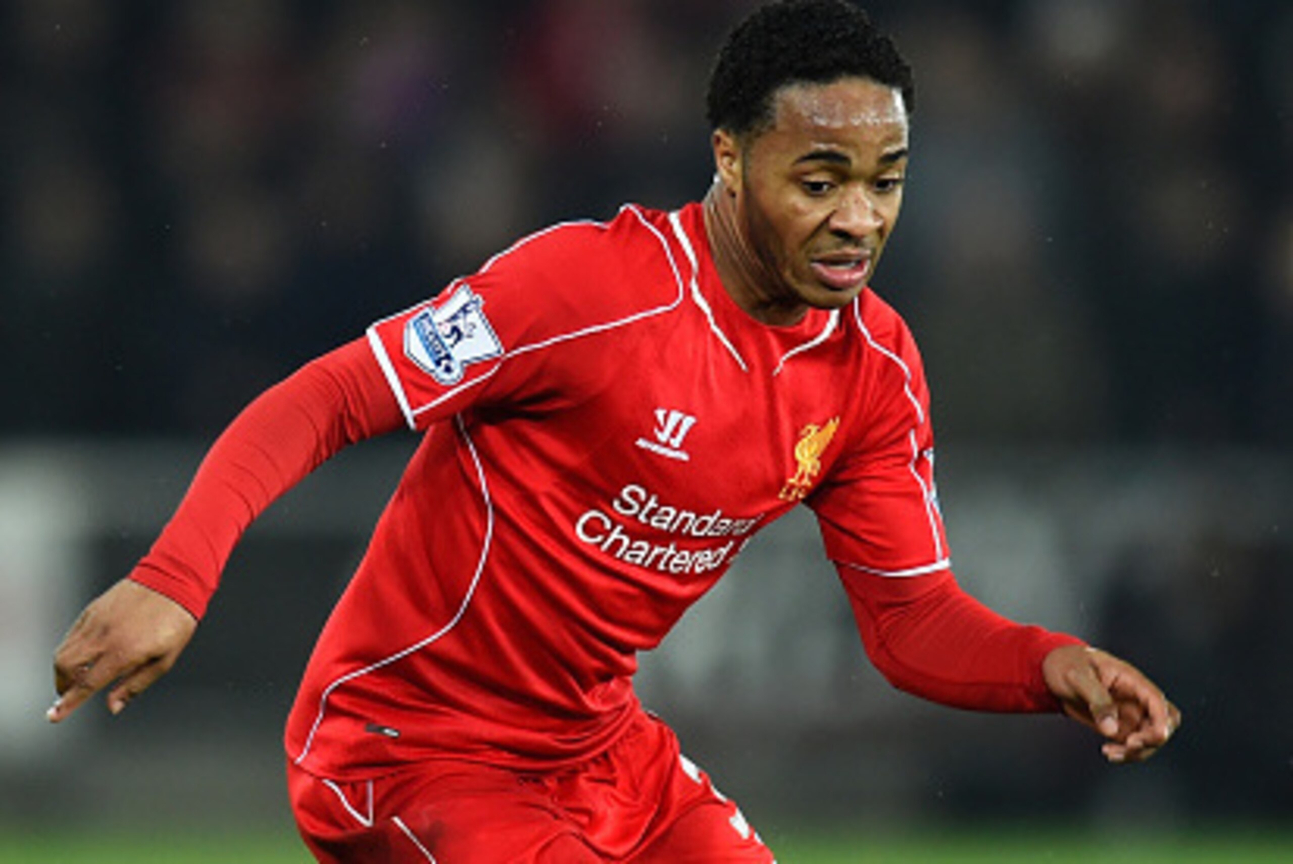 SWANSEA, WALES - MARCH 16:  Liverpool player Raheem Sterling in action during the Barclays Premiership match between Swansea City and Liverpool at Liberty Stadium on March 16, 2015 in Swansea, Wales.  (Photo by Stu Forster/Getty Images)