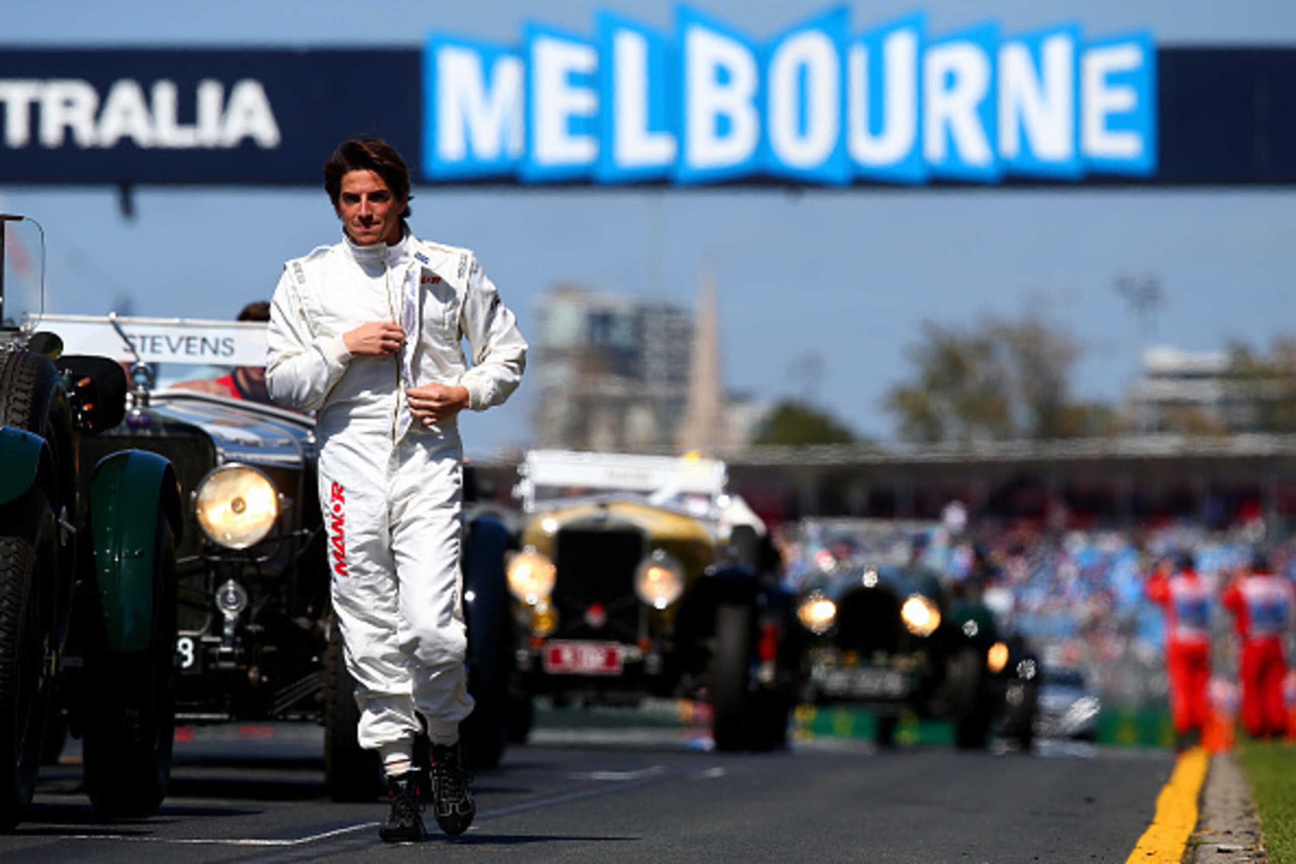 MELBOURNE, AUSTRALIA - MARCH 15:  Roberto Merhi of Spain and Manor Marussia walks along the grid during the drivers' parade before the Australian Formula One Grand Prix at Albert Park on March 15, 2015 in Melbourne, Australia.  (Photo by Mark Thompson/Get
