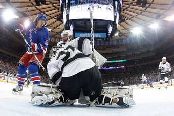 NEW YORK, NY - MARCH 24:  Jonathan Quick #32 of the Los Angeles Kings makes a save against Carl Hagelin #62 of the New York Rangers at Madison Square Garden on March 24, 2015 in New York City. The Los Angeles Kings won 4-2. (Photo by Jared Silber/NHLI via