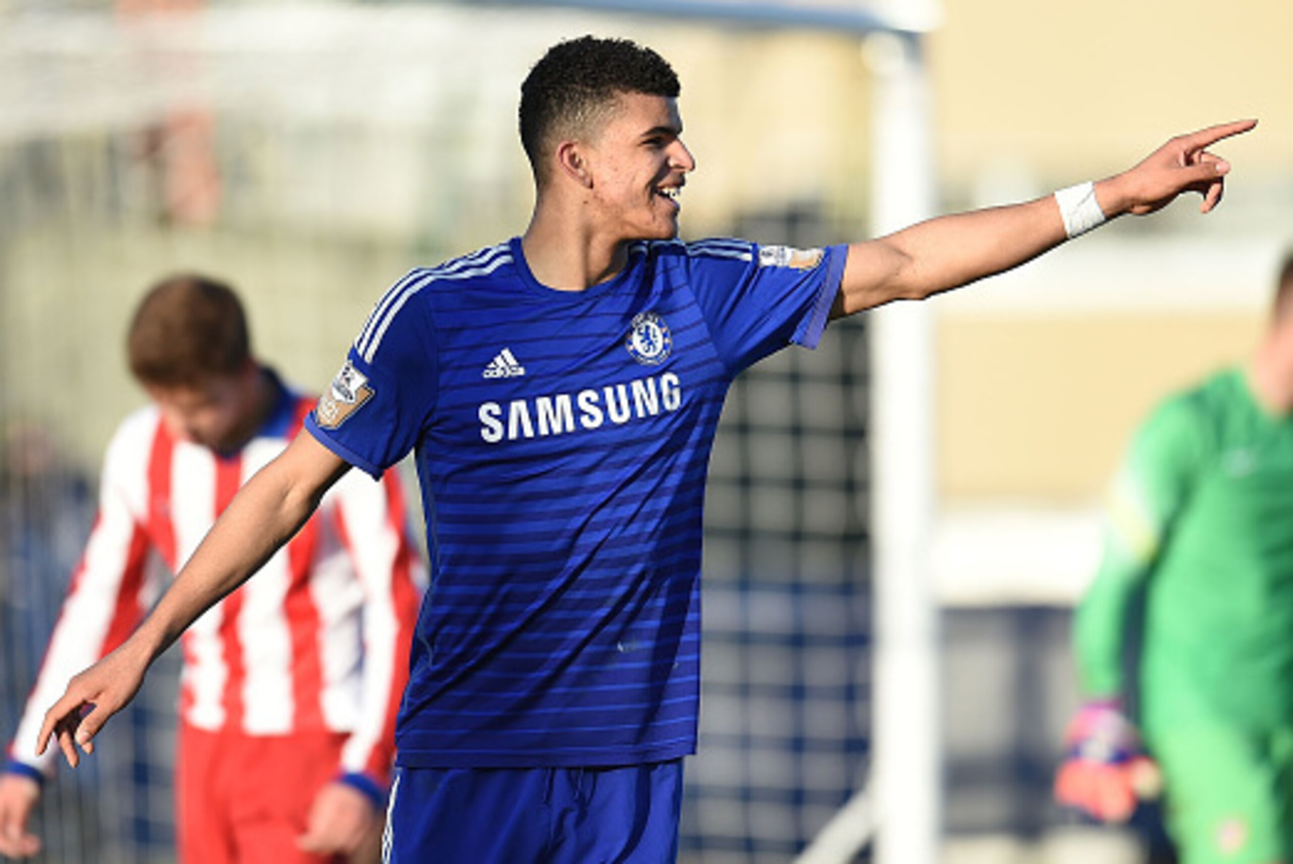 COBHAM, ENGLAND - MARCH 10:  Dominic Solanke of Chelsea celebrates scoring a goal during the UEFA Youth League Quarter Final match between Chelsea and Atletico Madrid at Chelsea Training Ground on March 10, 2015 in Cobham, England.  (Photo by Tom Dulat/Ge