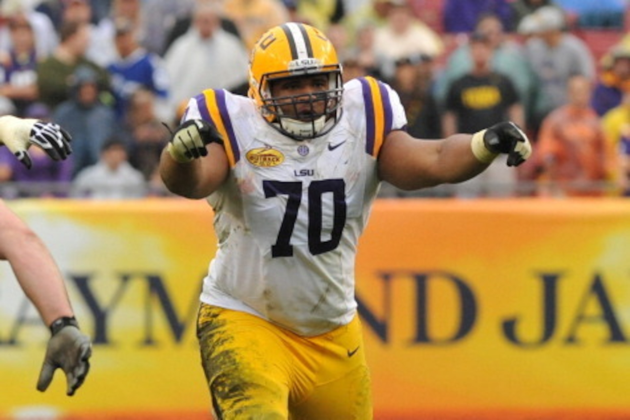 TAMPA, FL -  JANUARY 1:  Tackle Lael Collins #70 of the LSU Tigers sets for play against the Iowa Hawkeyes January 1, 2014  in the Outback Bowl at Raymond James Stadium in Tampa, Florida.  LSU won 21 - 14. (Photo by Al Messerschmidt/Getty Images)