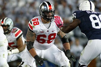 STATE COLLEGE, PA - OCTOBER 25:  Taylor Decker #68 of the Ohio State Buckeyes blocks during the game against the Penn State Nittany Lions on October 25, 2014 at Beaver Stadium in State College, Pennsylvania.  (Photo by Justin K. Aller/Getty Images)