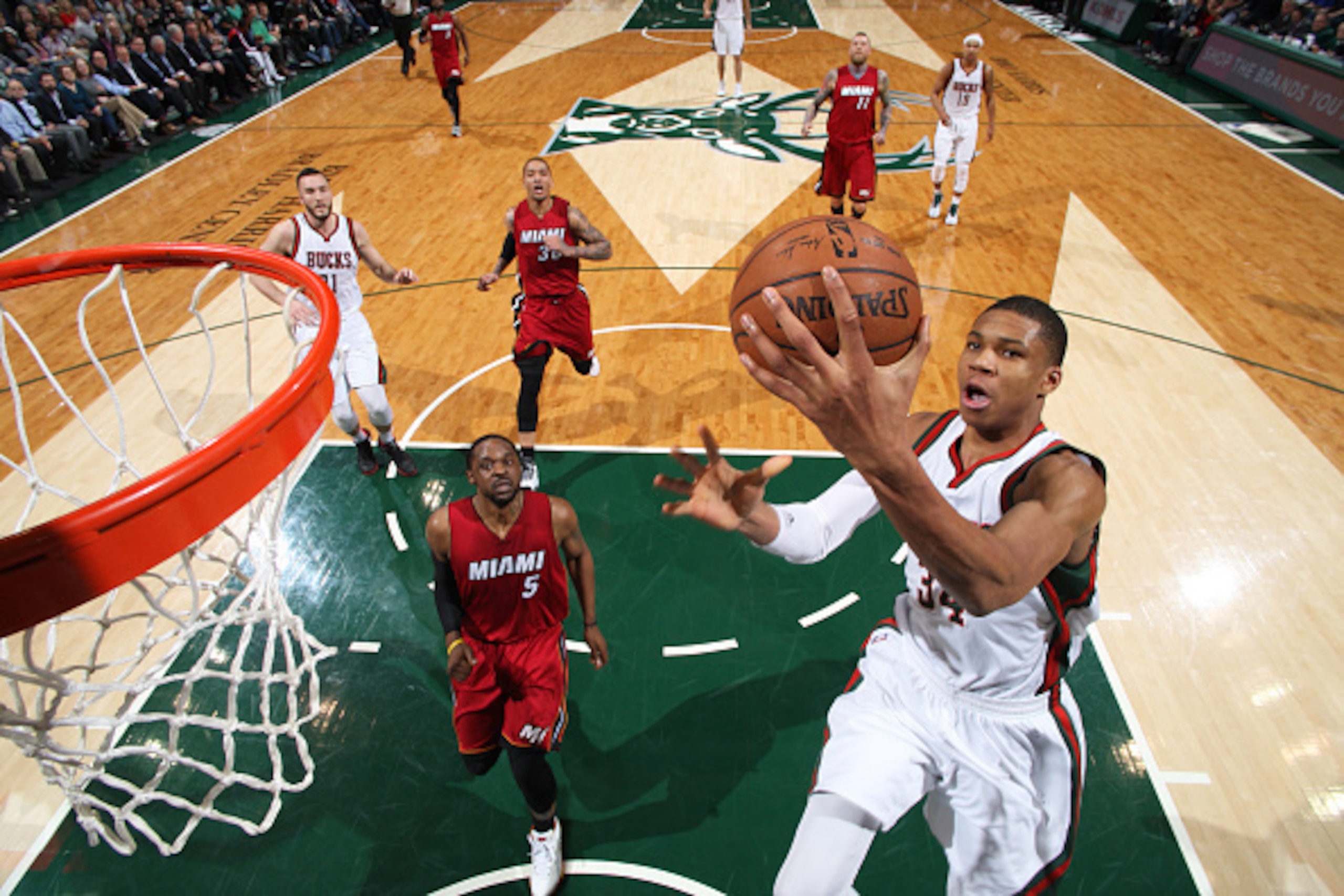 MILWAUKEE, WI - MARCH 24: Giannis Antetokounmpo #34 of the Milwaukee Bucks goes up for a shot against the Miami Heat on March 24, 2015 at BMO Harris Bradley Center in Milwaukee, Wisconsin. NOTE TO USER: User expressly acknowledges and agrees that, by down