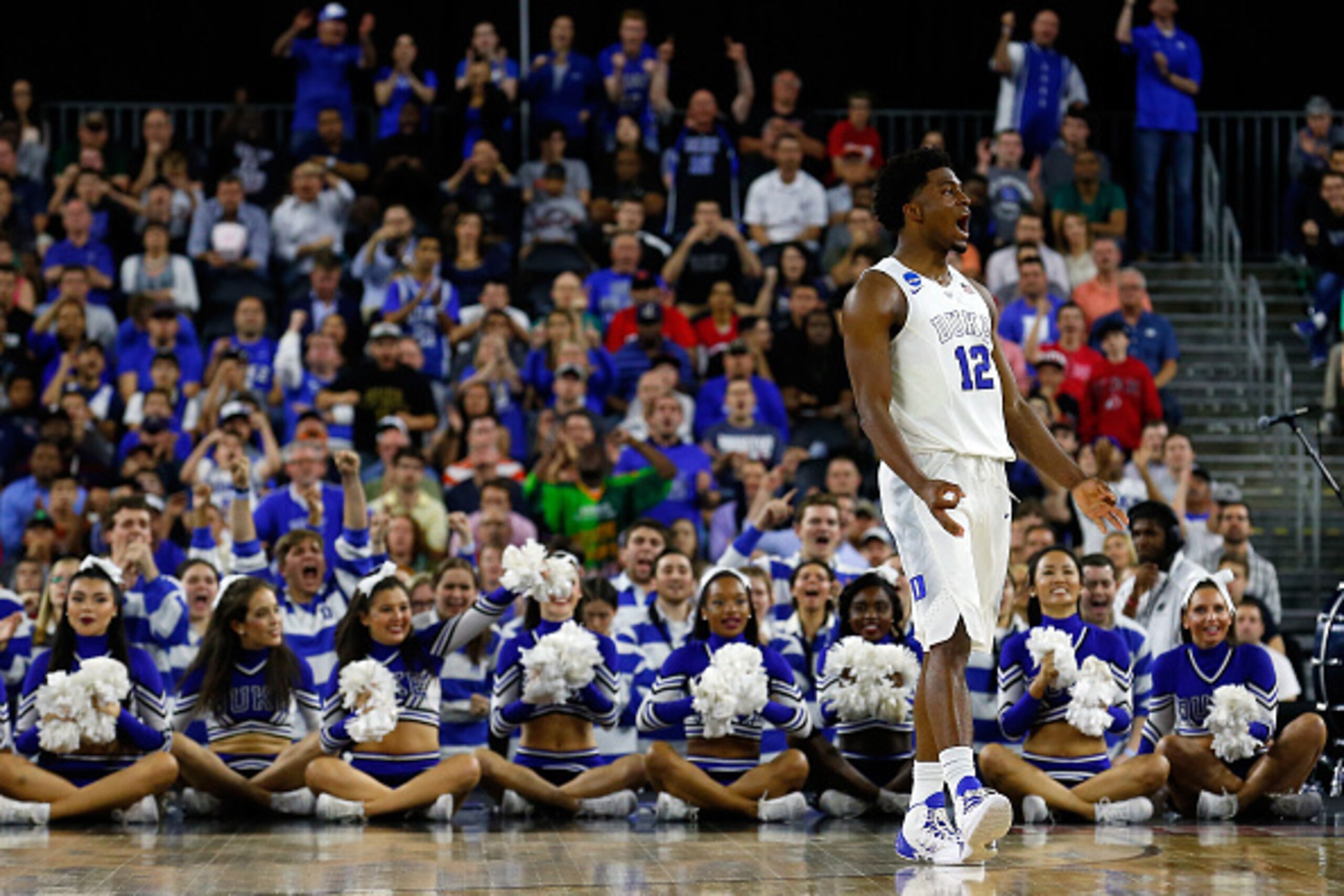 HOUSTON, TX - MARCH 27:  Justise Winslow #12 of the Duke Blue Devils reacts against the Utah Utes during a South Regional Semifinal game of the 2015 NCAA Men's Basketball Tournament at NRG Stadium on March 27, 2015 in Houston, Texas.  (Photo by Tom Pennin