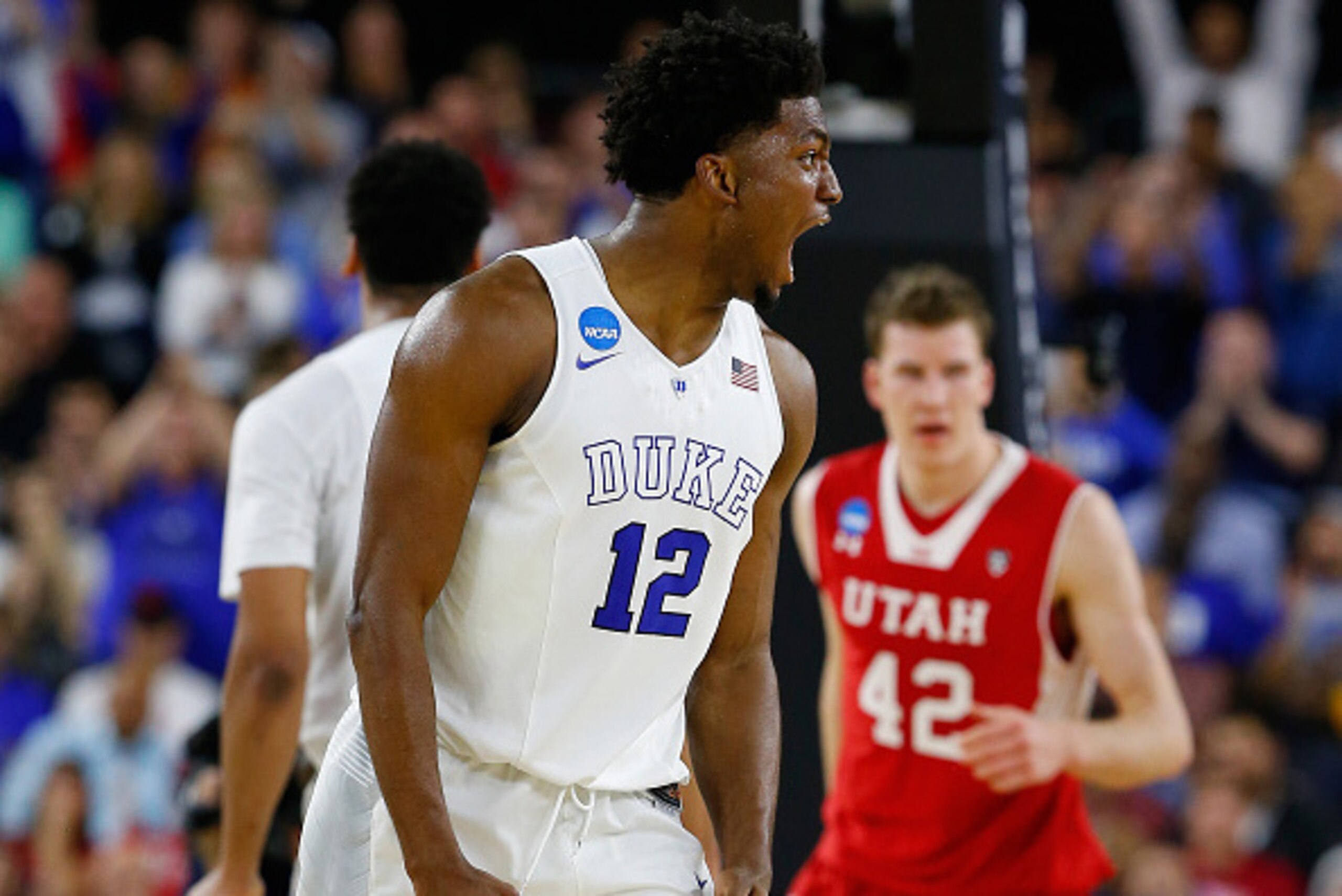 HOUSTON, TX - MARCH 27: Justise Winslow #12 of the Duke Blue Devils reacts against the Utah Utes during a South Regional Semifinal game of the 2015 NCAA Men's Basketball Tournament at NRG Stadium on March 27, 2015 in Houston, Texas. (Photo by Tom Pennin HOUSTON, TX - MARCH 27: Justise Winslow #12 of the Duke Blue Devils reacts against the Utah Utes during a South Regional Semifinal game of the 2015 NCAA Men's Basketball Tournament at NRG Stadium on March 27, 2015 in Houston, Texas. (Photo by Tom Pennin