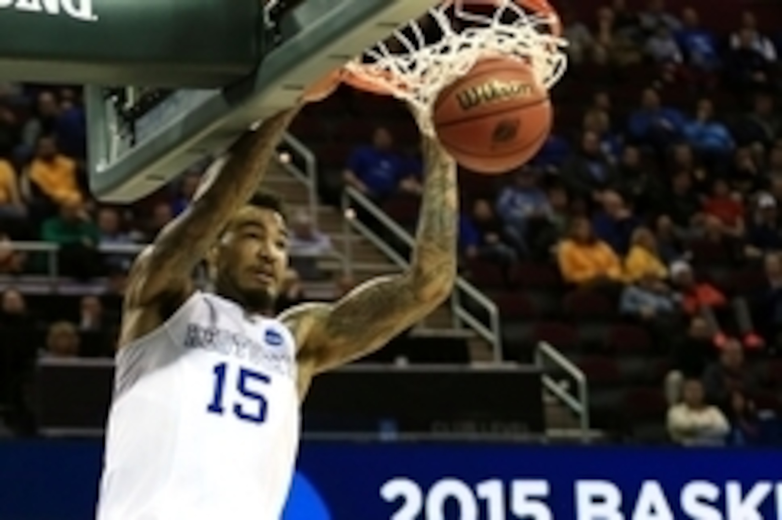 Mar 26, 2015; Cleveland, OH, USA; Kentucky Wildcats forward Willie Cauley-Stein (15) dunks during the second half against the West Virginia Mountaineers in the semifinals of the midwest regional of the 2015 NCAA Tournament at Quicken Loans Arena. Mandator
