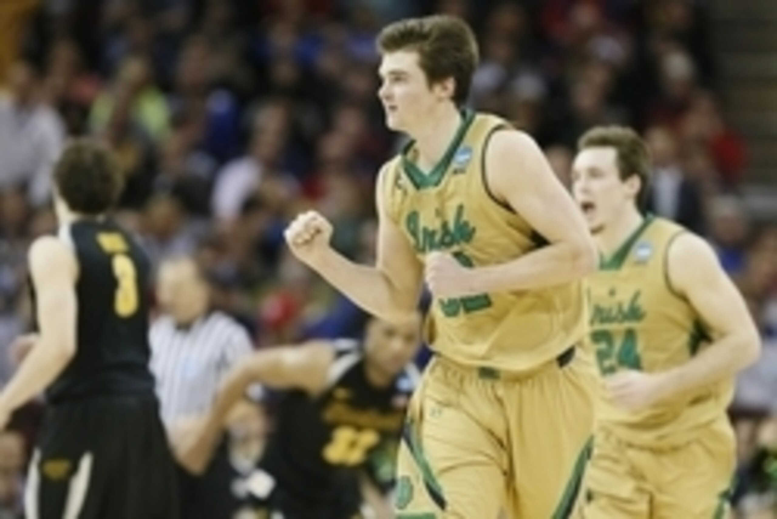 Mar 26, 2015; Cleveland, OH, USA; Notre Dame Fighting Irish guard Steve Vasturia (32) and guard/forward Pat Connaughton (24) react during the second half against the Wichita State Shockers in the semifinals of the midwest regional of the 2015 NCAA Tournam