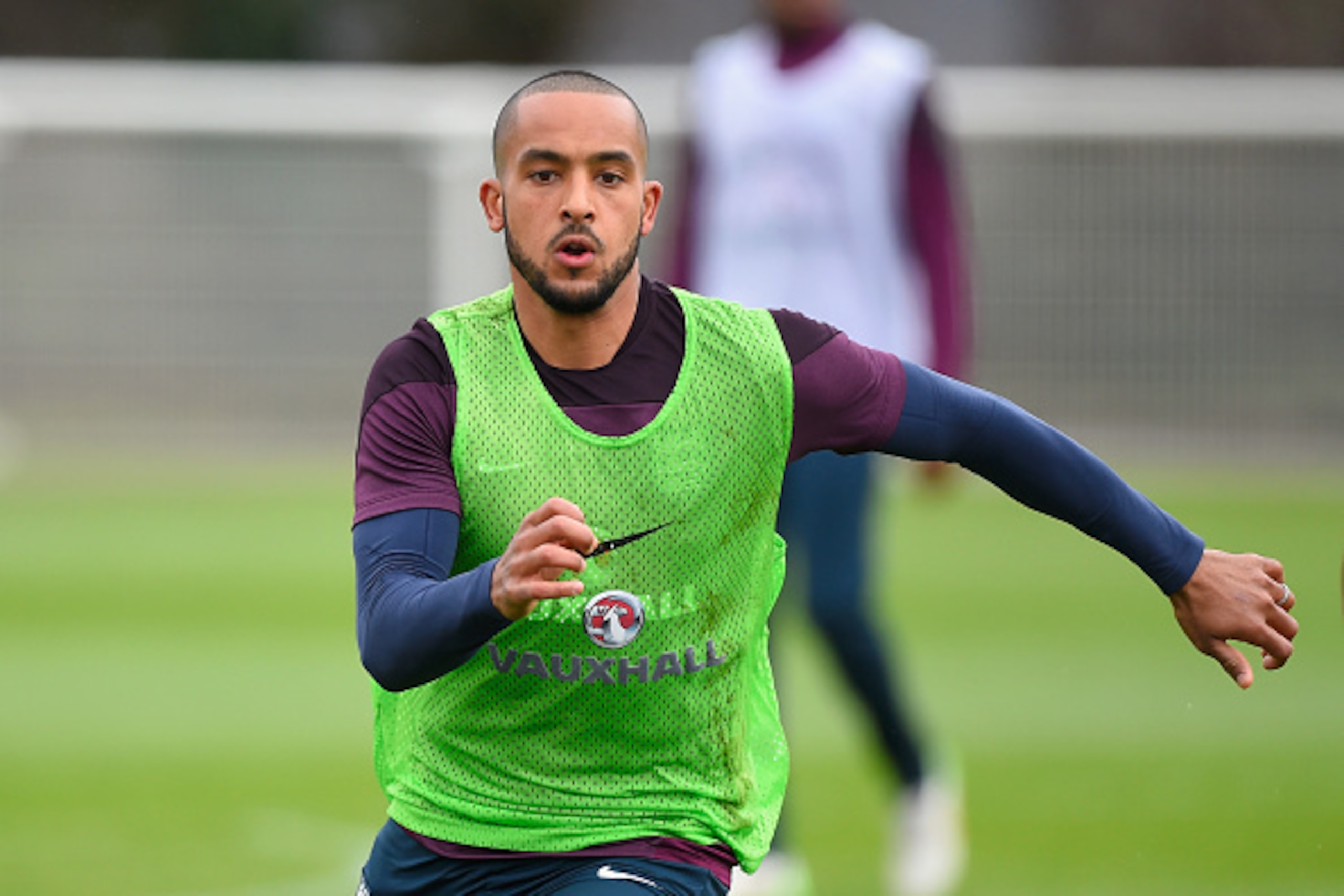 ENFIELD, ENGLAND - MARCH 26:  Theo Walcott of England runs during an England training session ahead of the Euro 2016 qualifier against Lithuania at Enfield Training Centre on March 26, 2015 in Enfield, England.  (Photo by Mike Hewitt/Getty Images)