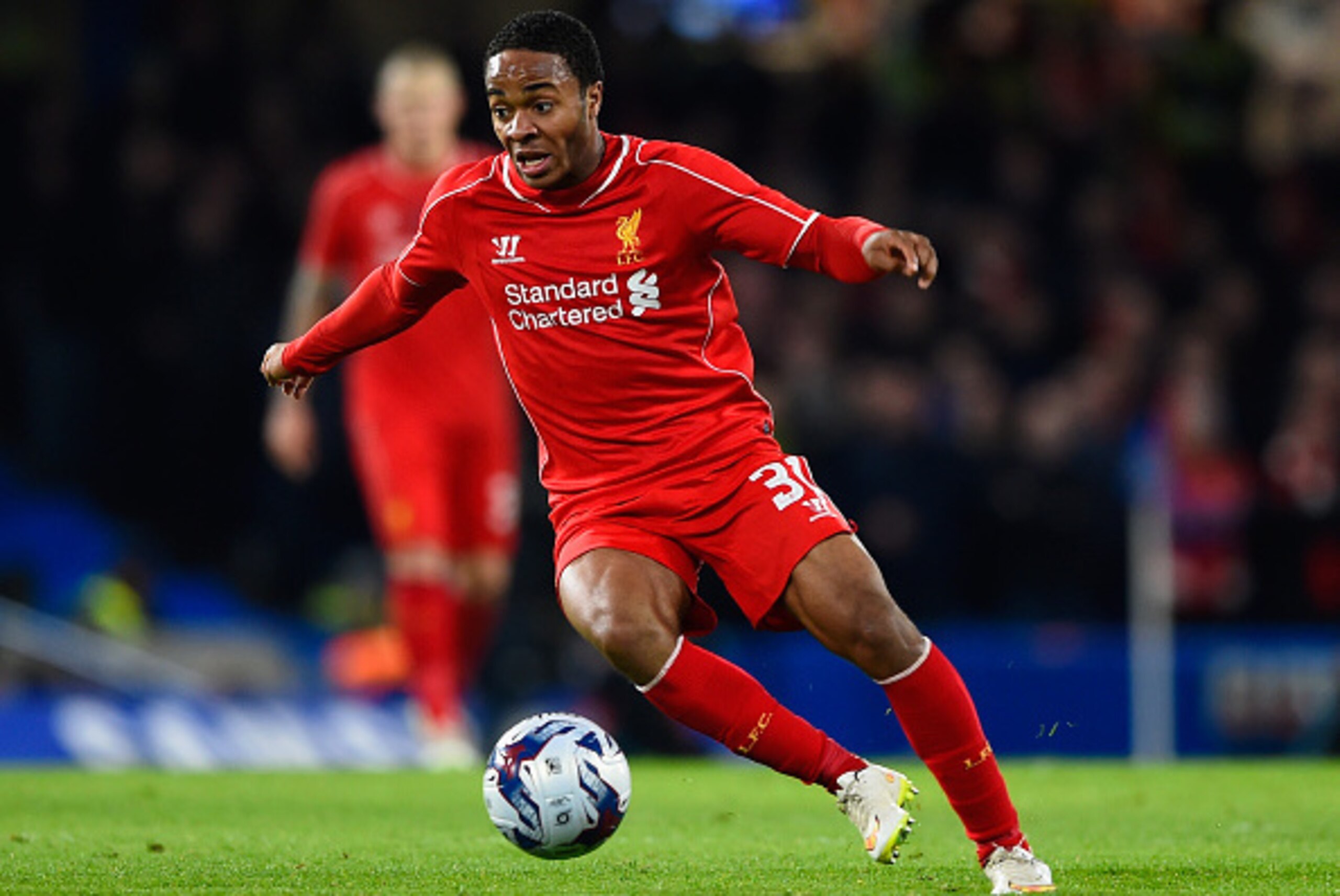 LONDON, ENGLAND - JANUARY 27:  Raheem Sterling of Liverpool on the ball during the Capital One Cup Semi-Final second leg between Chelsea and Liverpool at Stamford Bridge on January 27, 2015 in London, England.  (Photo by Mike Hewitt/Getty Images)