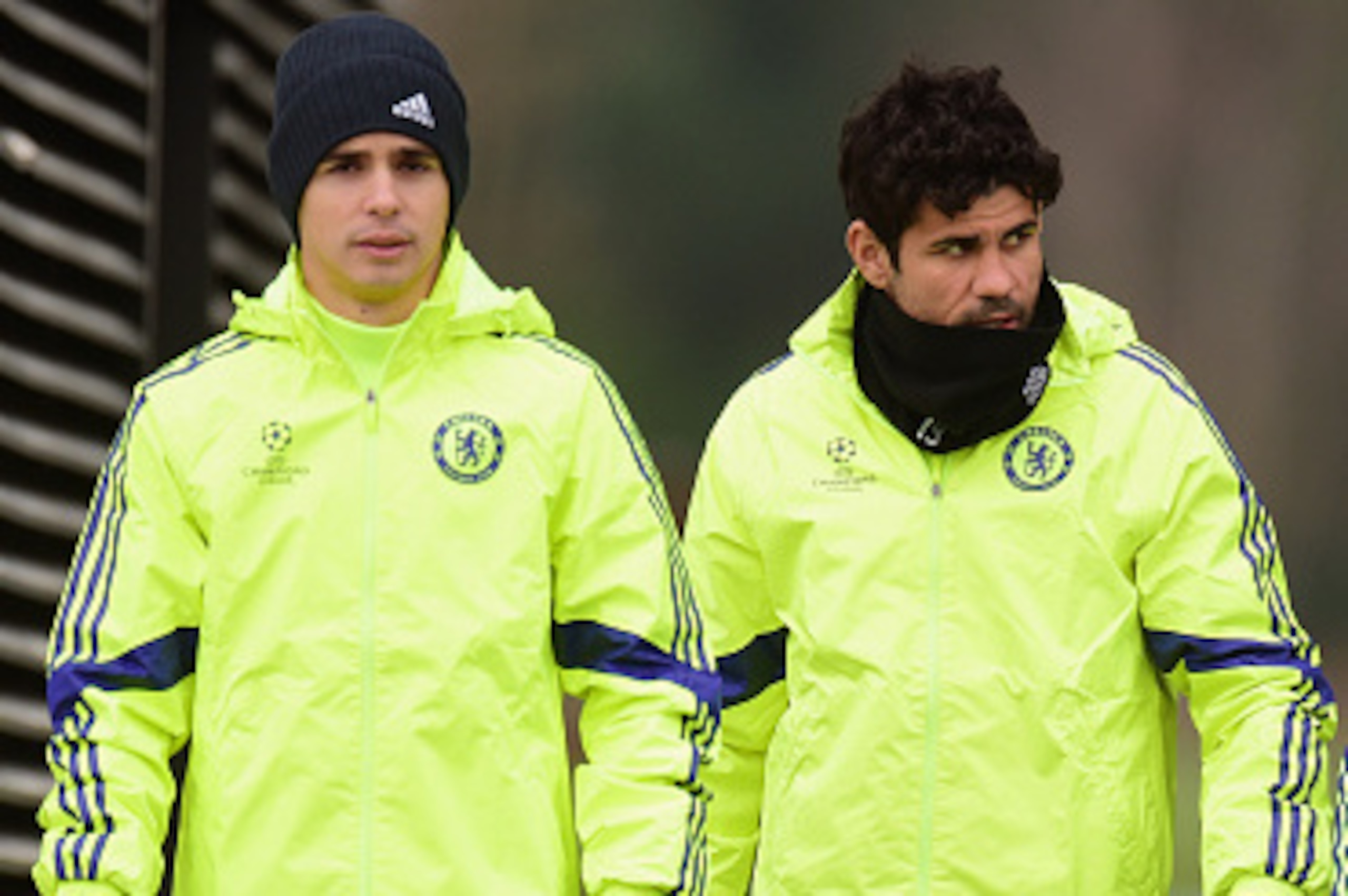 LONDON, ENGLAND - FEBRUARY 16:  (L-R) Oscar, Diego Costa and Filipe Luis of Chelsea talk during a Chelsea training session ahead of the UEFA Champions League round of 16 match against Paris Saint-Germain at Cobham Training Centre on February 16, 2015 in L