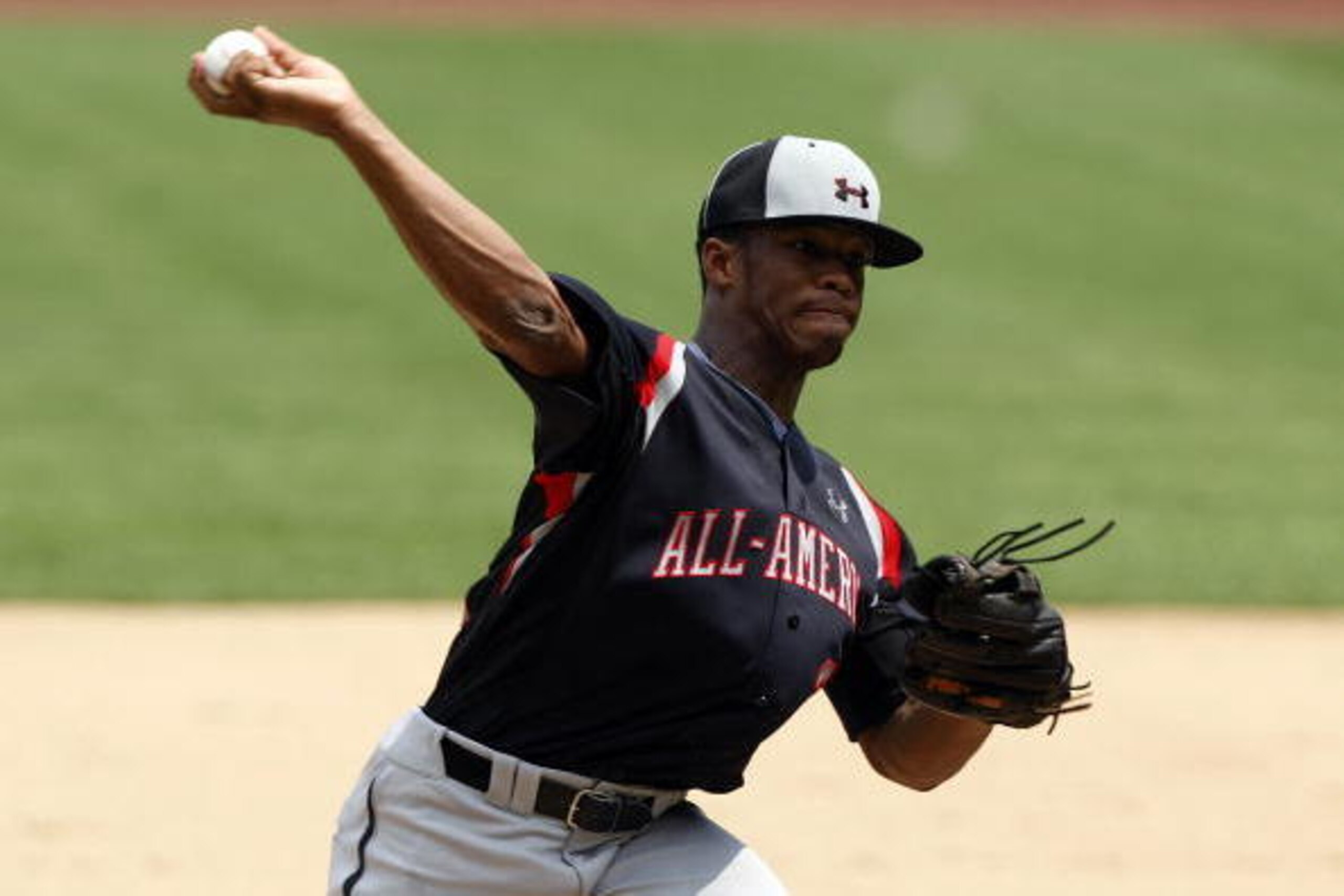 CHICAGO - AUGUST 8: DeAndre Smelter of the Baseball Factory pitches against Team One  during the  Under Armour All-American Baseball game on August 8, 2009 at Wrigley Field in Chicago, Illinois.  (Photo by Jim Prisching/Getty Images)