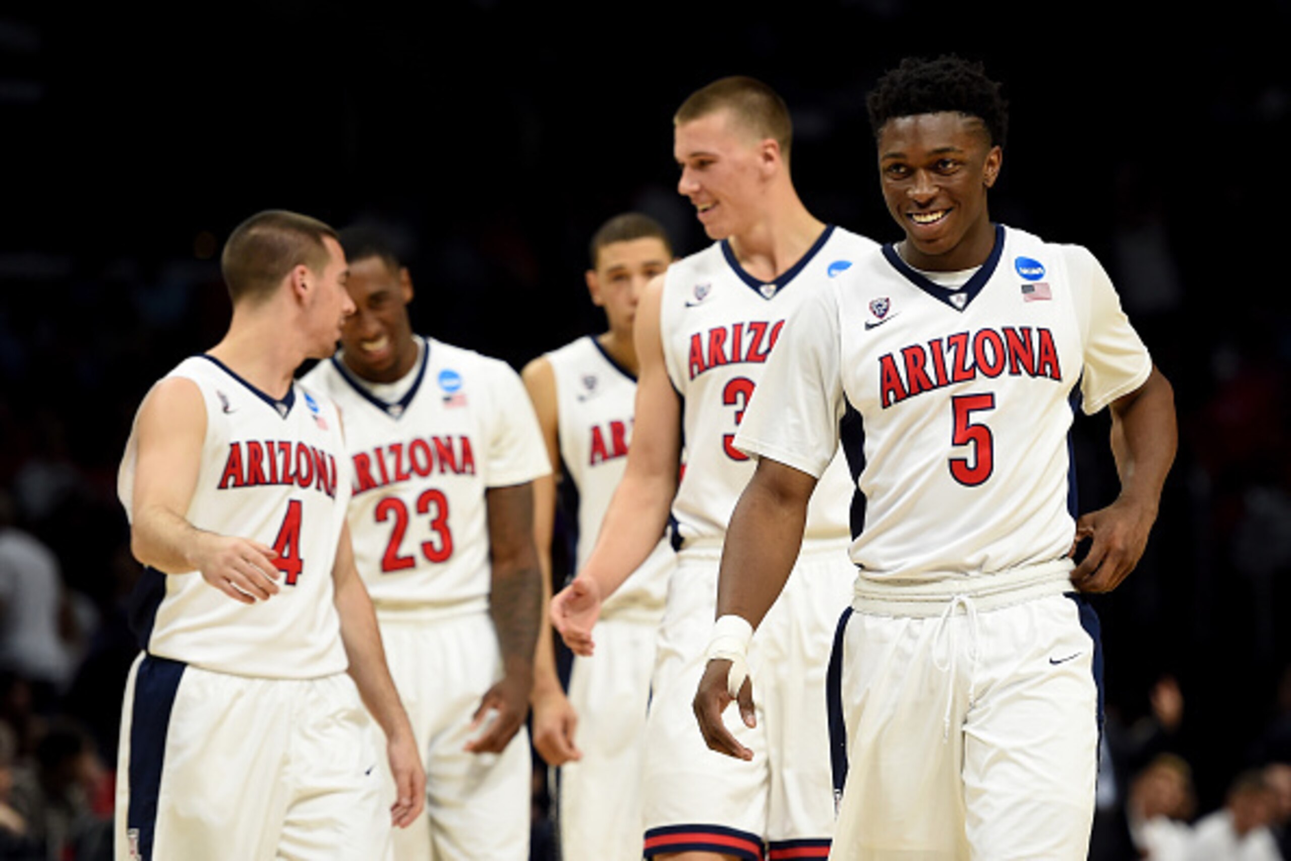 LOS ANGELES, CA - MARCH 26:  Stanley Johnson #5, Kaleb Tarczewski #35, Brandon Ashley #21, Rondae Hollis-Jefferson #23 and T.J. McConnell #4 of the Arizona Wildcats walk on the court to start the second half against the Xavier Musketeers during the West R