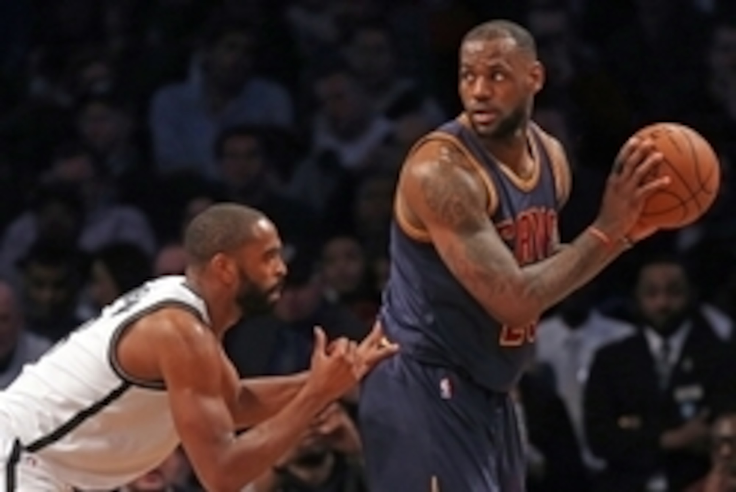 Mar 27, 2015; Brooklyn, NY, USA; Cleveland Cavaliers forward LeBron James (23) defended by Brooklyn Nets forward Joe Johnson (7) during the second half at Barclays Center. The Nets defeated the Cavaliers 106 - 98. Mandatory Credit: Adam Hunger-USA TODAY S