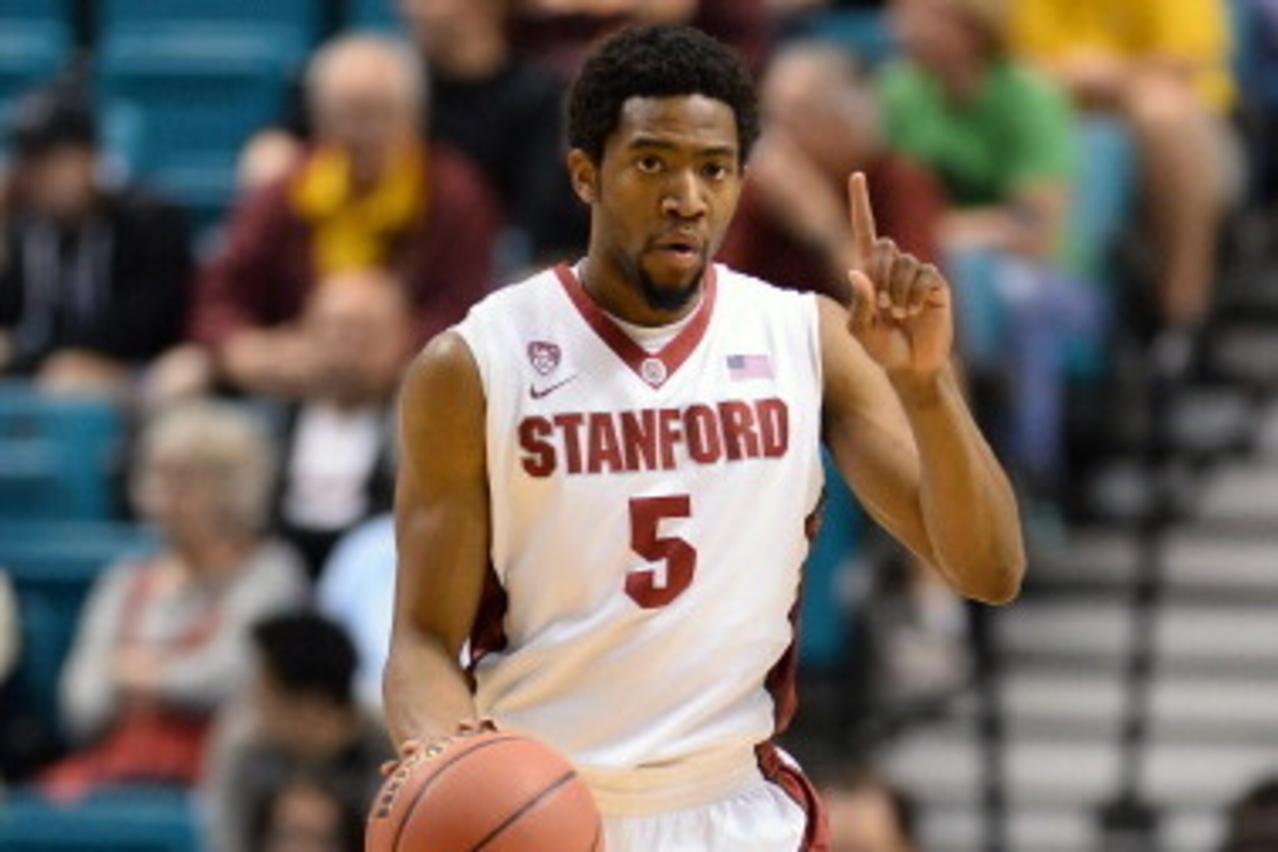 LAS VEGAS, NV - MARCH 12:  Chasson Randle #5 of the Stanford Cardinal brings the ball up the court against the Washington State Cougars during a first-round game of the Pac-12 Basketball Tournament at the MGM Grand Garden Arena on March 12, 2014 in Las Ve