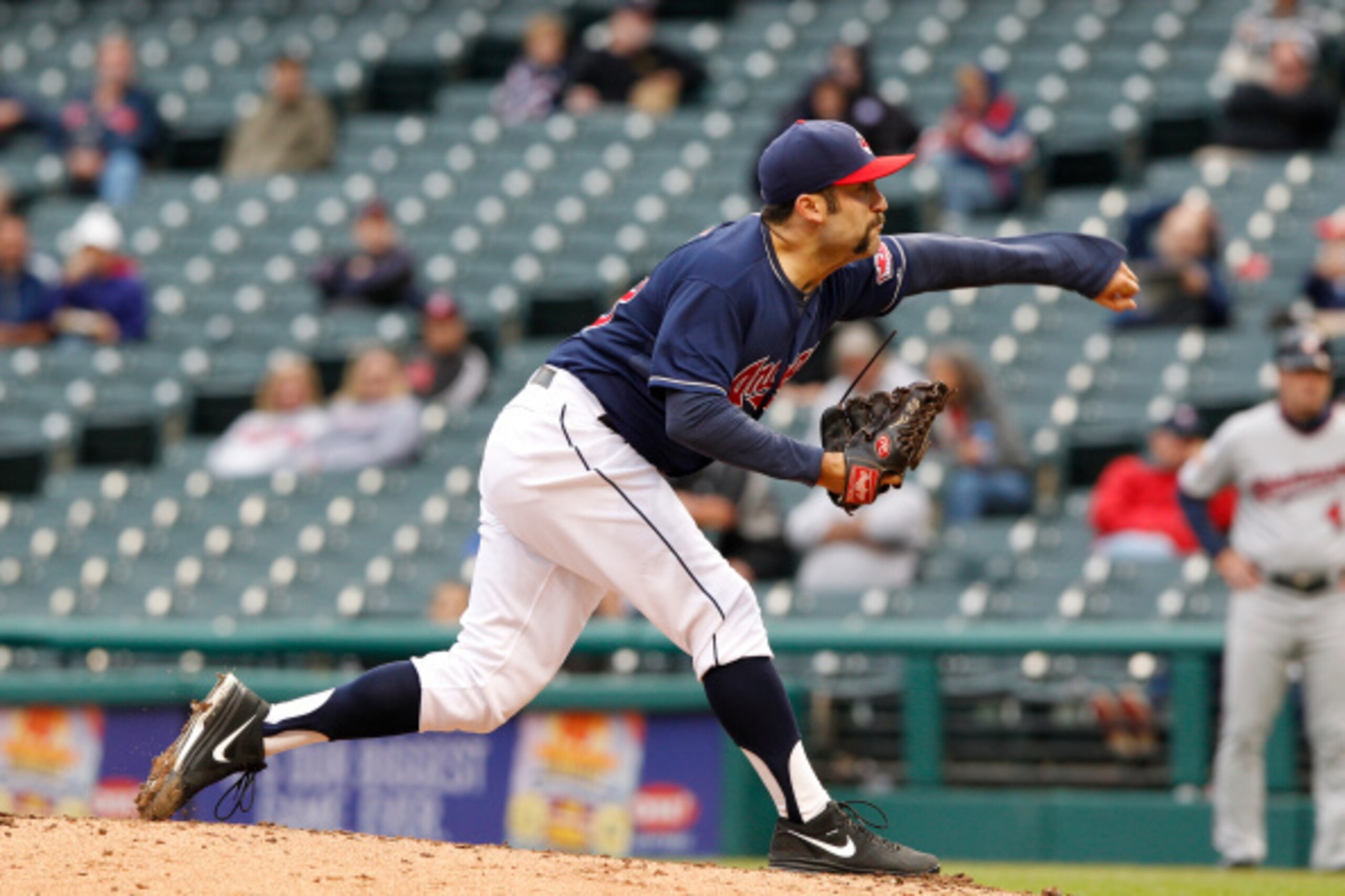 CLEVELAND, OH - SEPTEMBER 11:  T.J. House #58 of the Cleveland Indians pitches against the Minnesota Twins during the fifth inning of the second game a doubleheader on September 11, 2014 at Progressive Field in Cleveland, Ohio. The Indians defeated the Tw